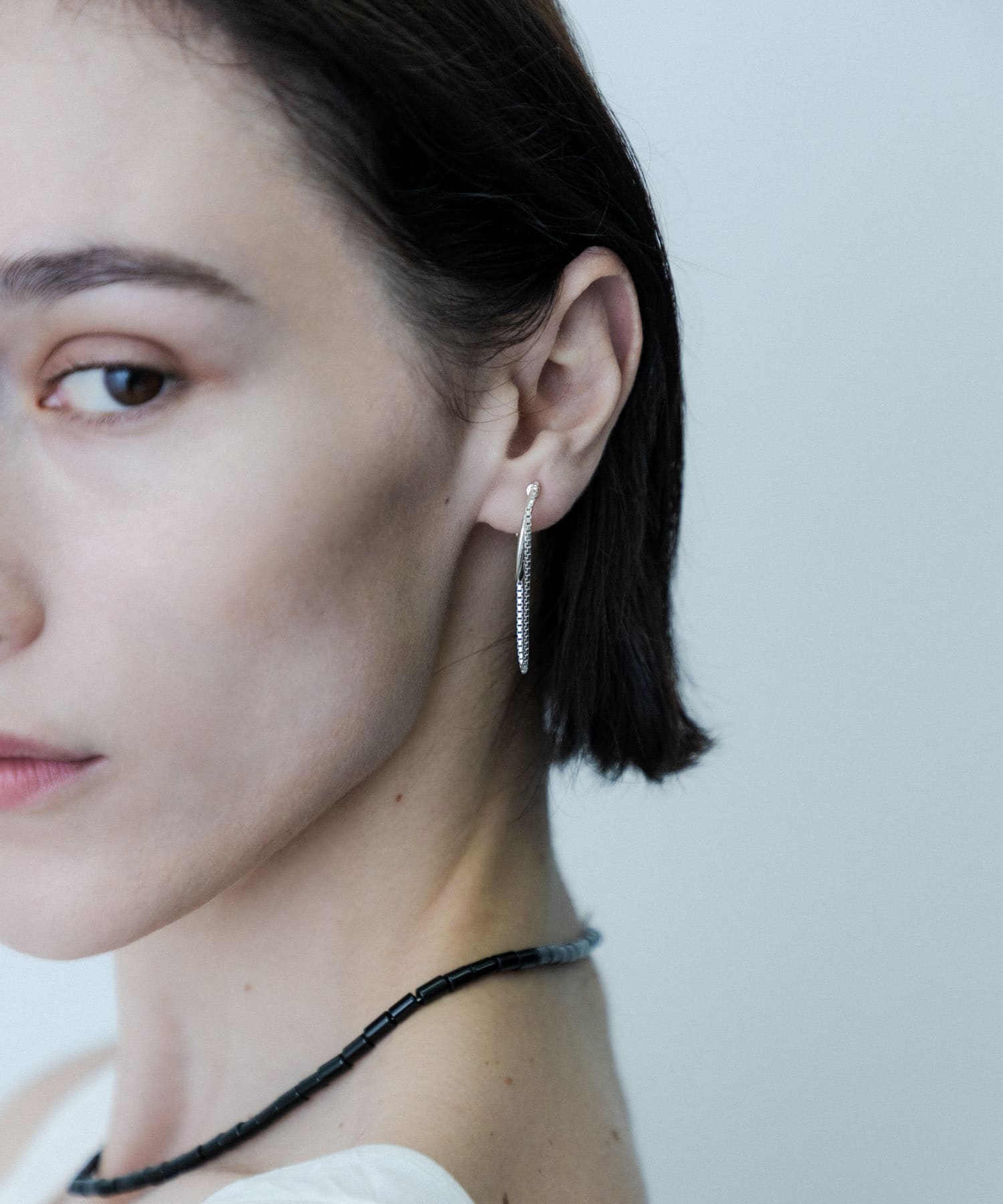 SMELLY so’　combination chain earring SLV -
