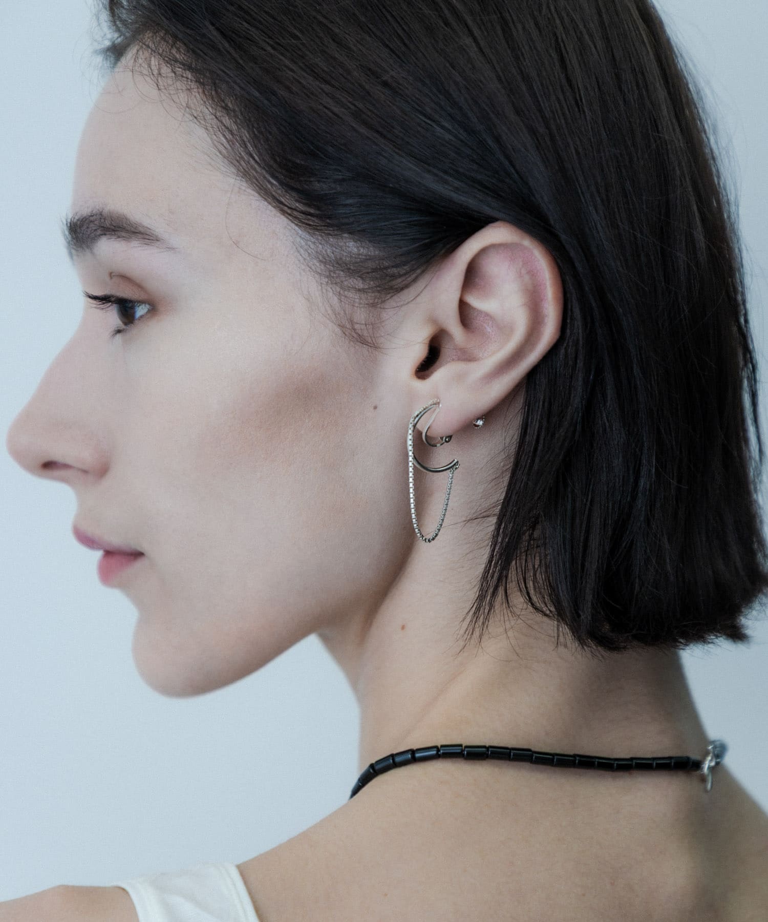 SMELLY so’　combination chain earring SLV -