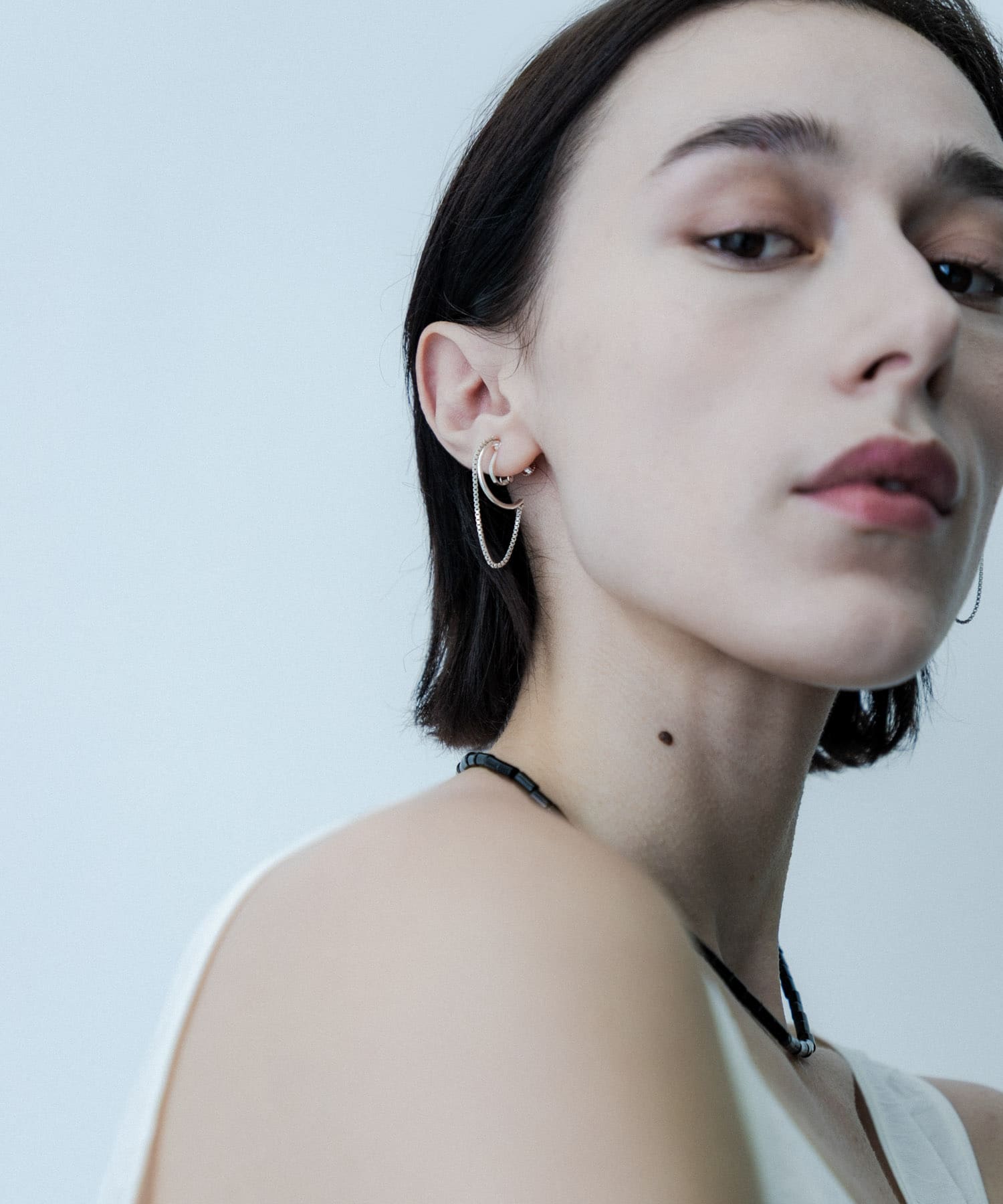 SMELLY so’　combination chain earring SLV -