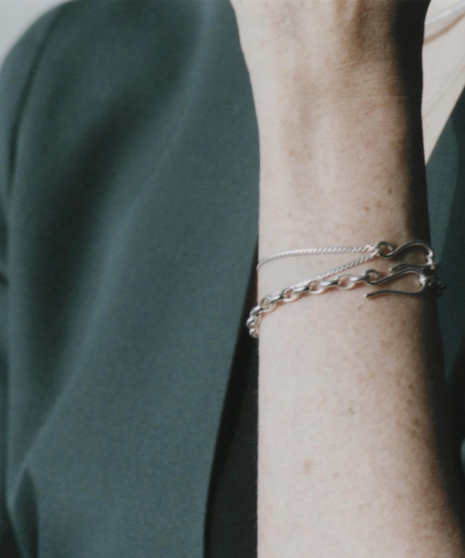 SMELLY so’　connected chain bracelet SLV -