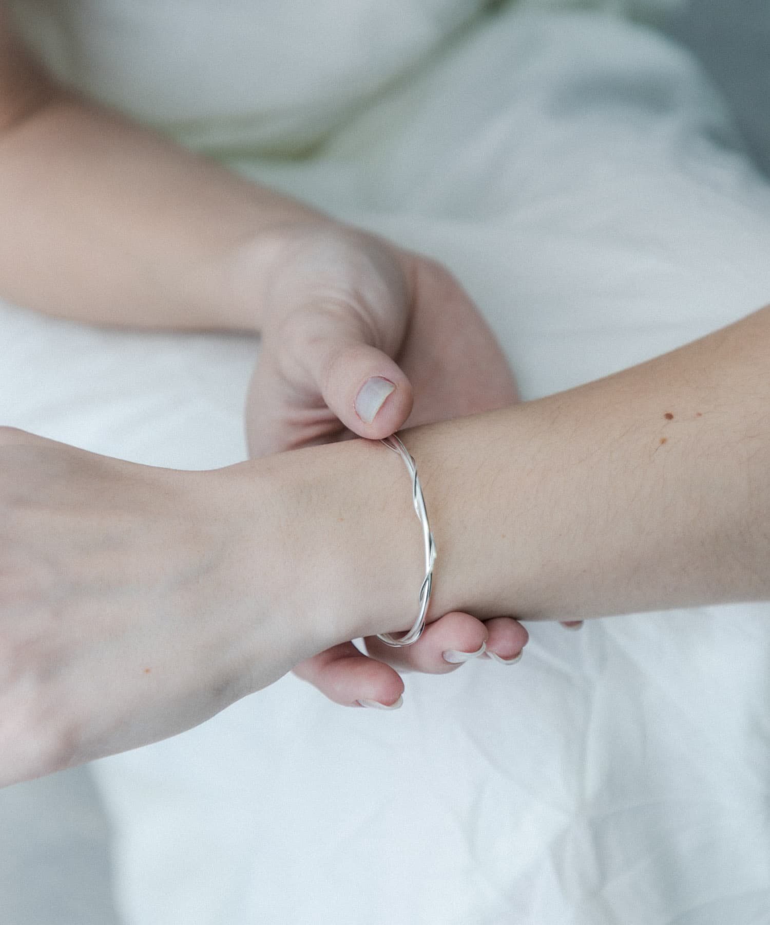 SMELLY so’　twist chain bangle SLV -