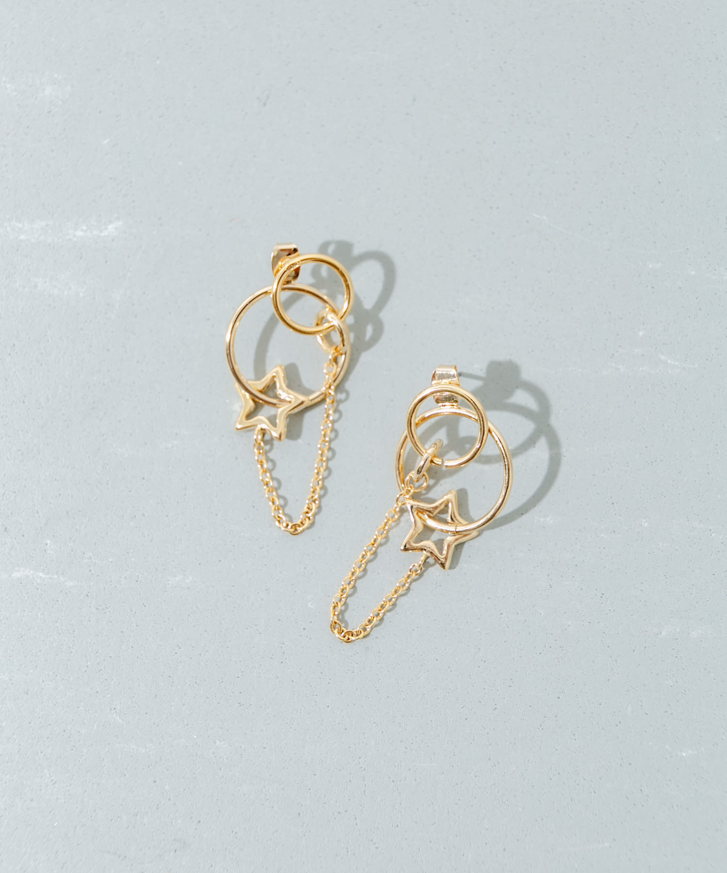 サークルスターチェーンコンビピアス GLD -