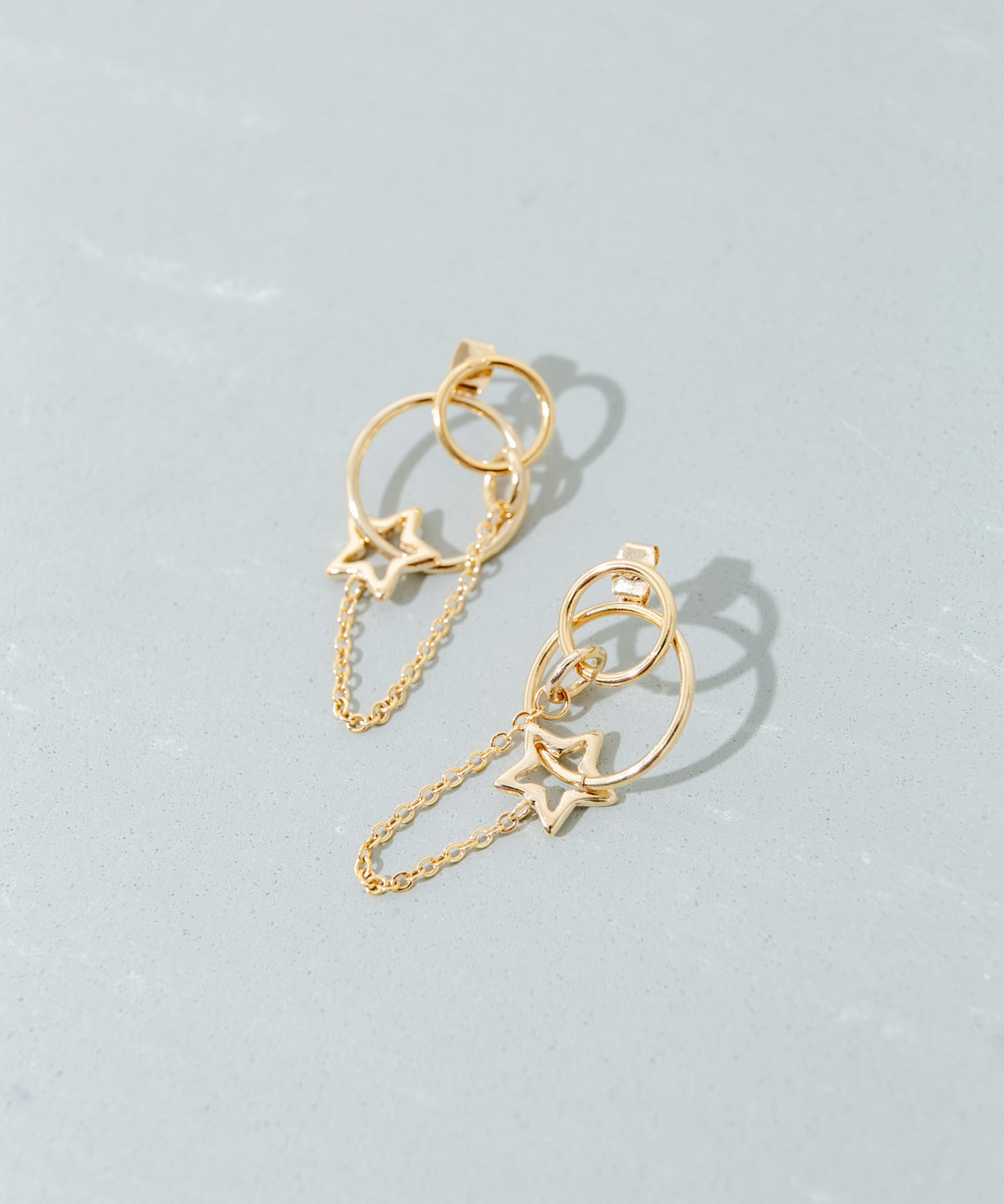 サークルスターチェーンコンビピアス GLD -