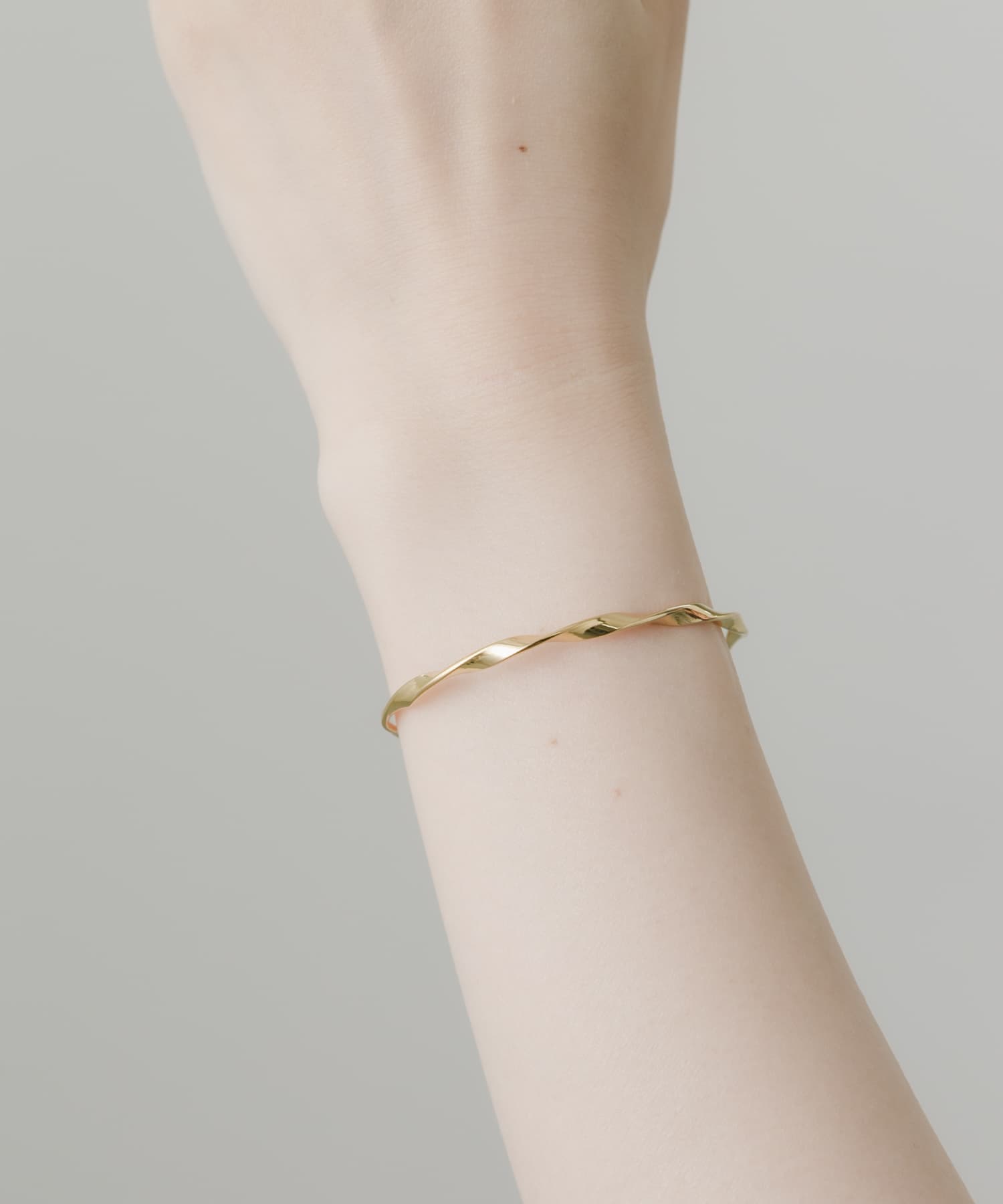 ステンレスツイストバングル GLD -