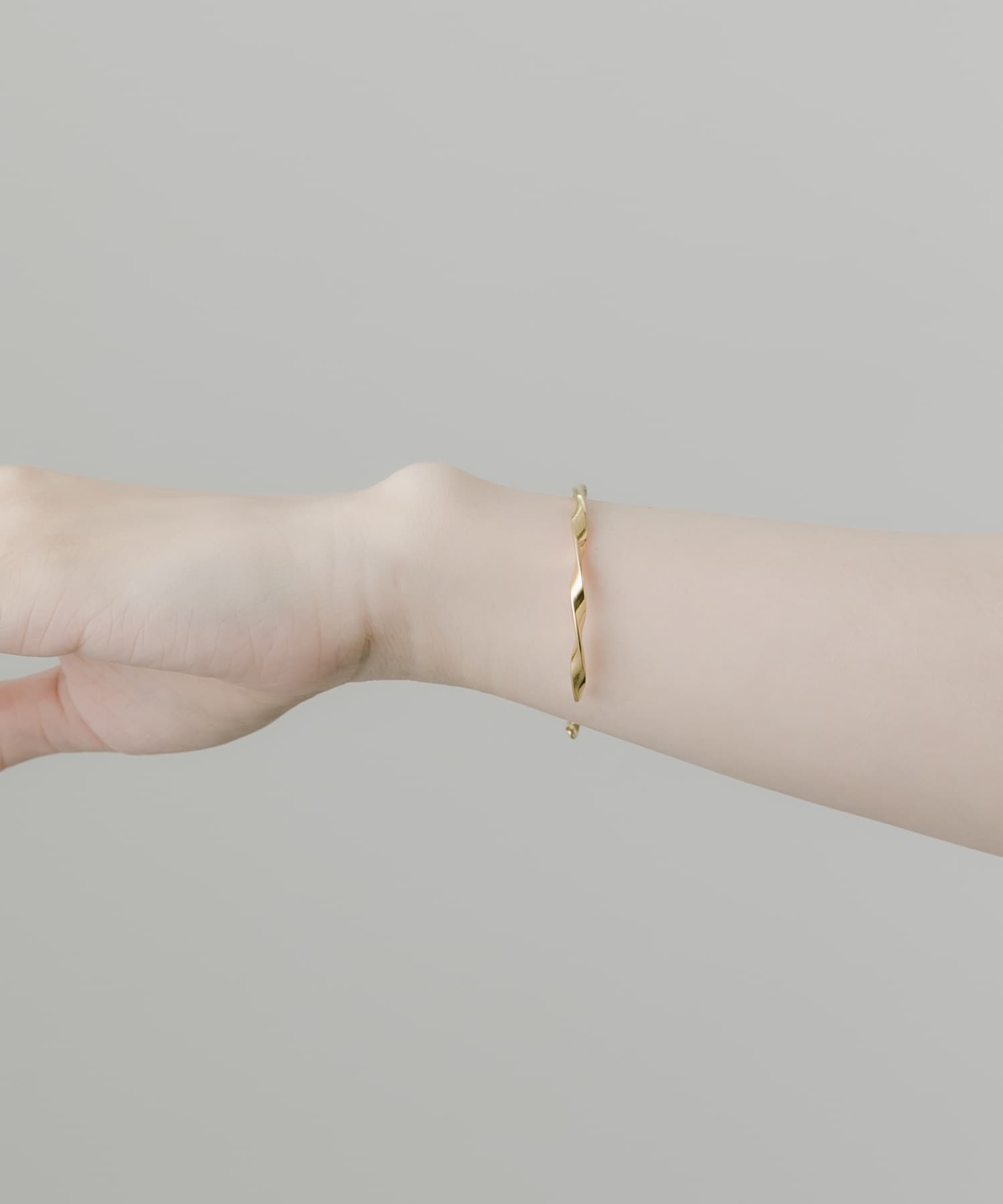 ステンレスツイストバングル GLD -