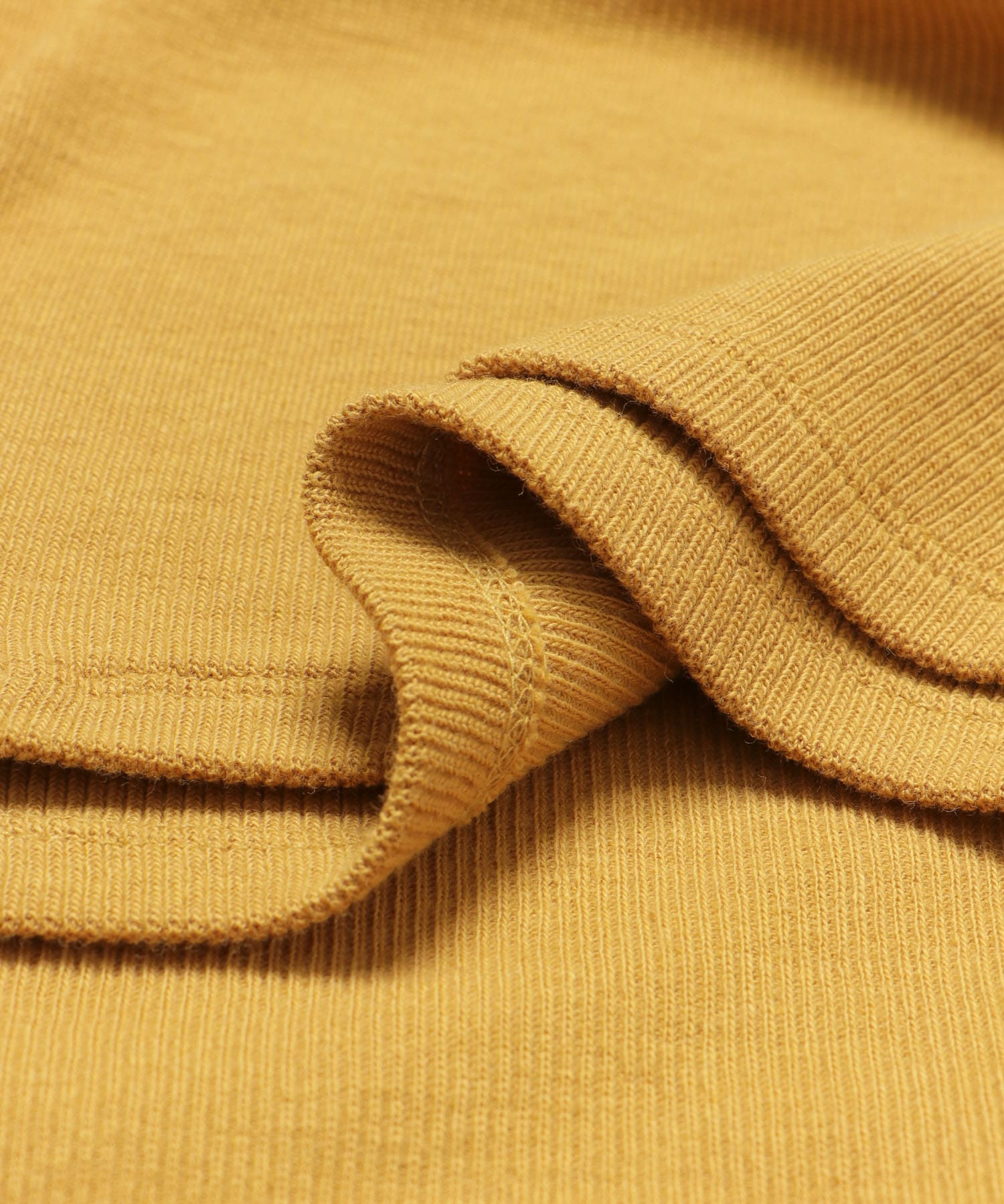 レイヤードボタンディテールトップ YELLOW one
