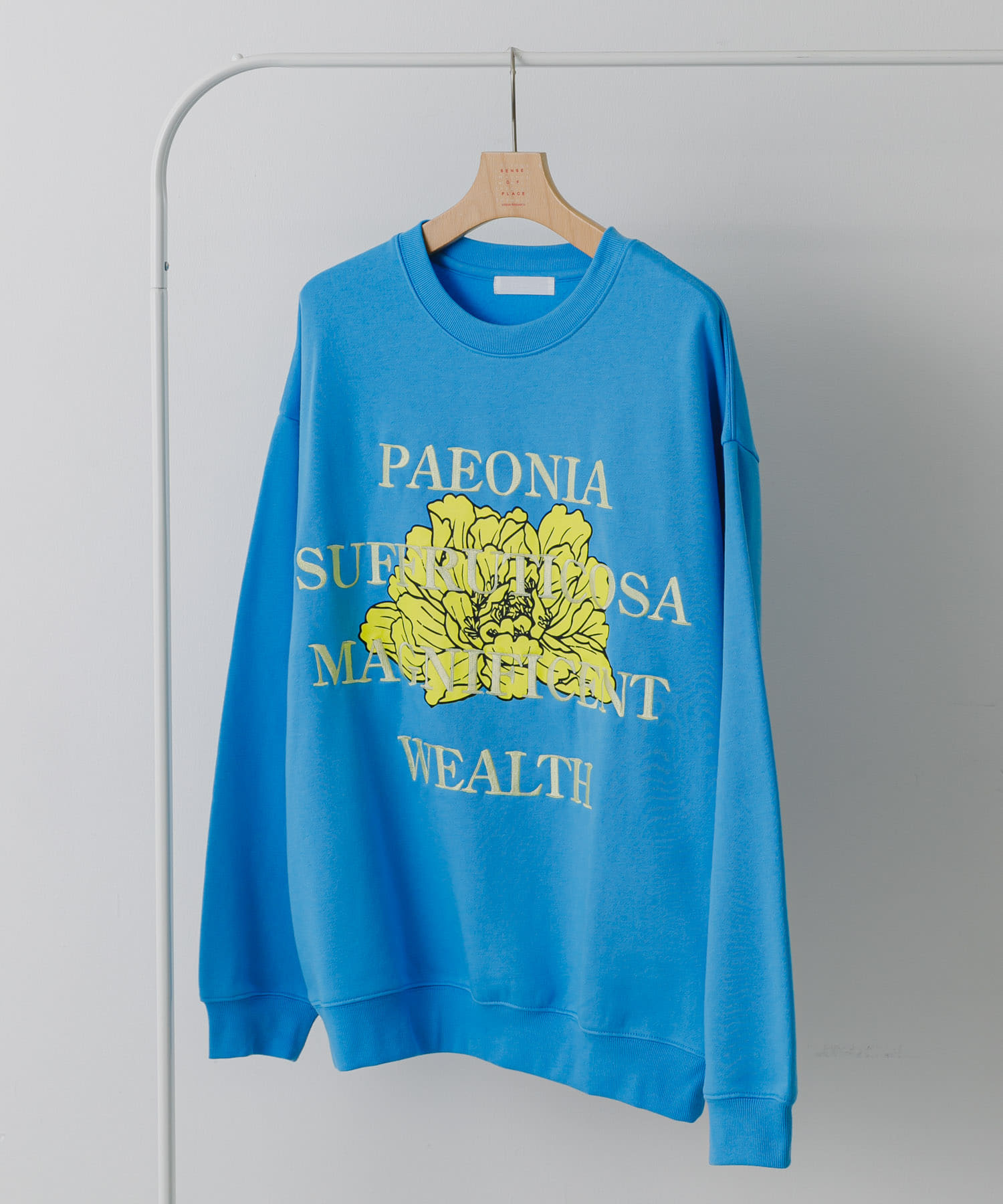 ボタニカルグラフィッククルーネックスウェット L.BLUE M