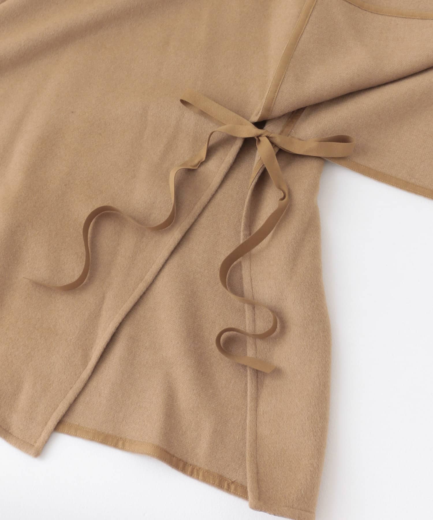 bolsista　PONCHO CAMEL FREE