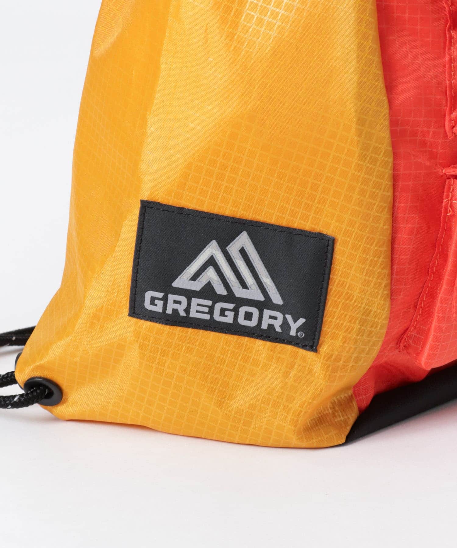 NEXUSVII.×GREGORY　PARASITE KNAPSACK YEL×ORN FREE