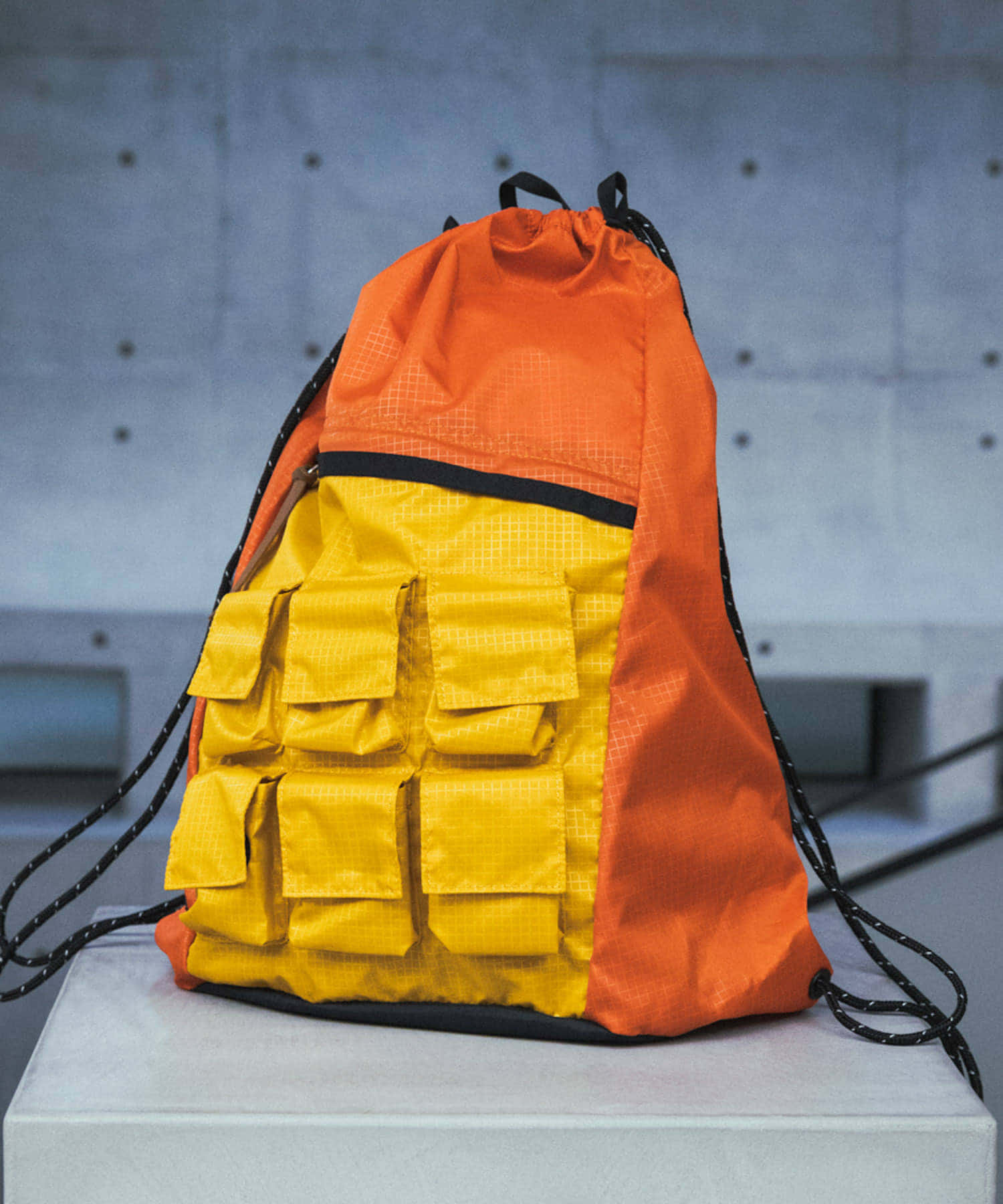 NEXUSVII.×GREGORY　PARASITE KNAPSACK ORN×YEL FREE