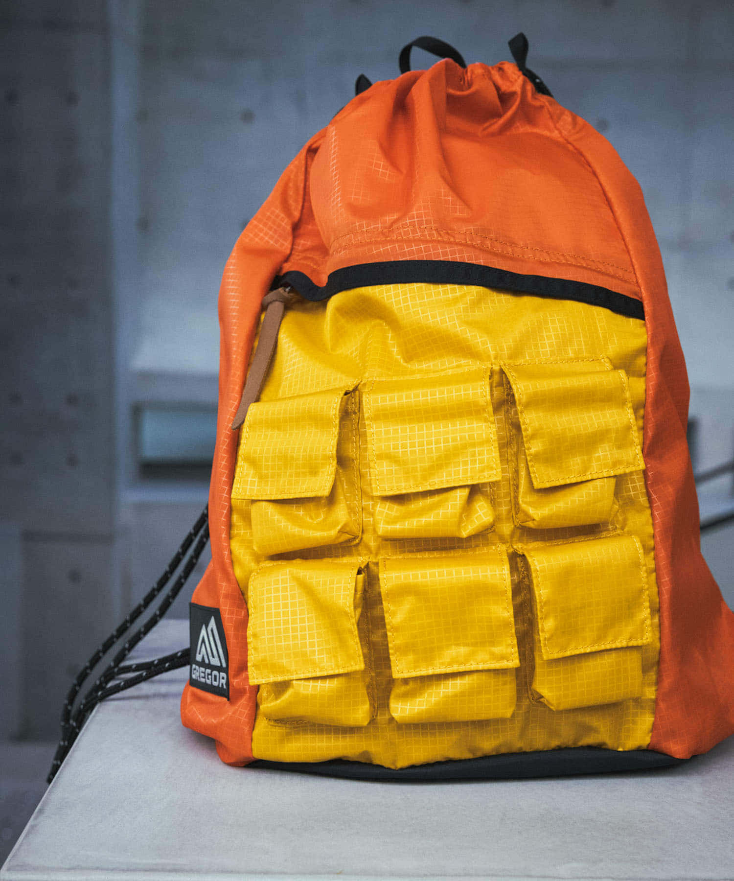 NEXUSVII.×GREGORY　PARASITE KNAPSACK ORN×YEL FREE