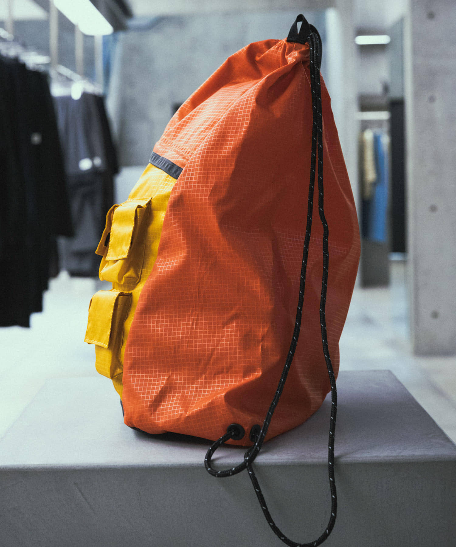 NEXUSVII.×GREGORY　PARASITE KNAPSACK ORN×YEL FREE