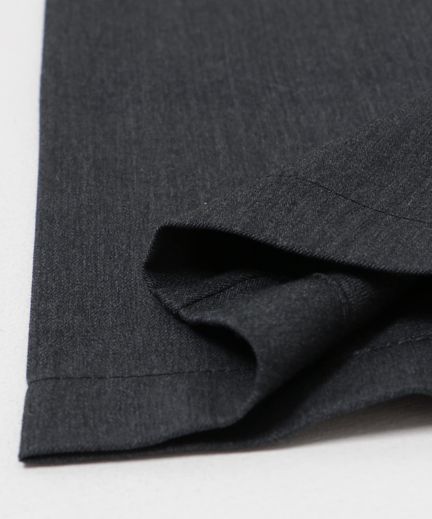 new basic ウールツイルテーパードスラックス CHARCOAL S