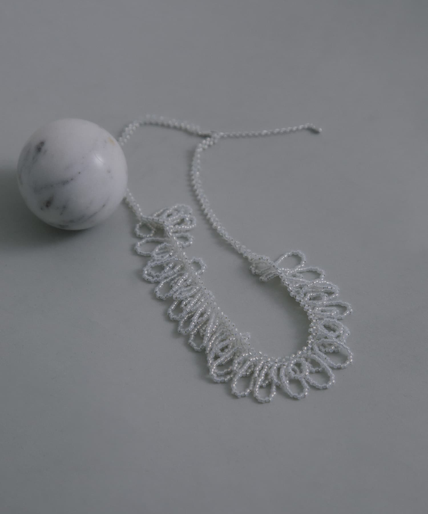 decor『デコール』　Fringe Necklace CLEAR -