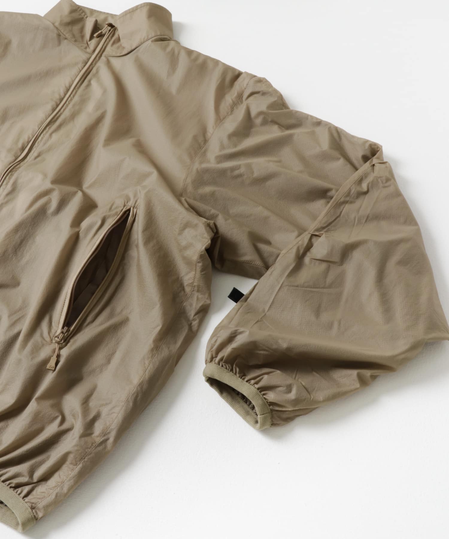 DAIWA PIER39　TECH REVERSIBLE WIND SHIELD JACKET BEIGE S