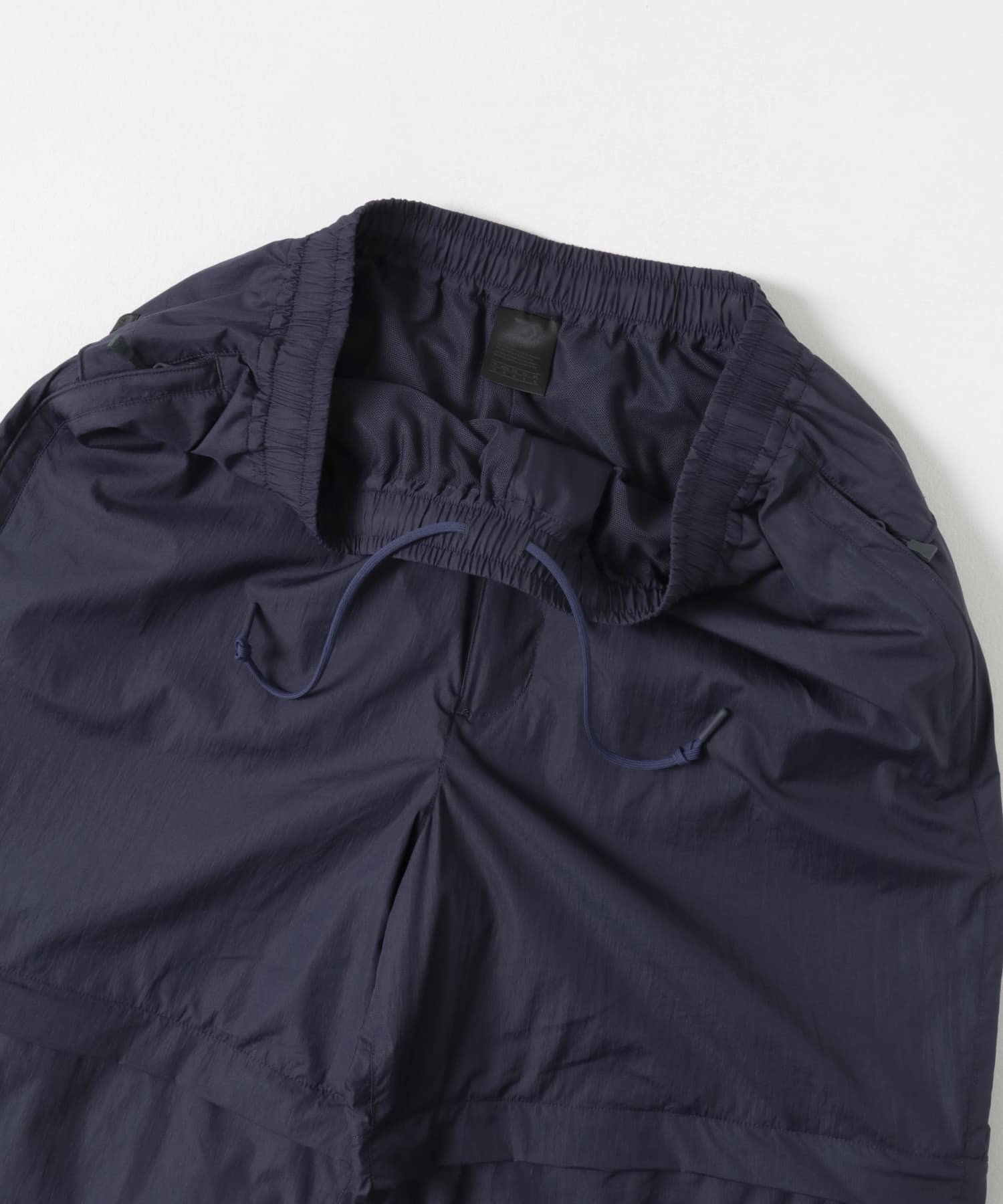 DAIWA PIER39　DECHATABLE WINDBREAKER PANTS M NAVY M