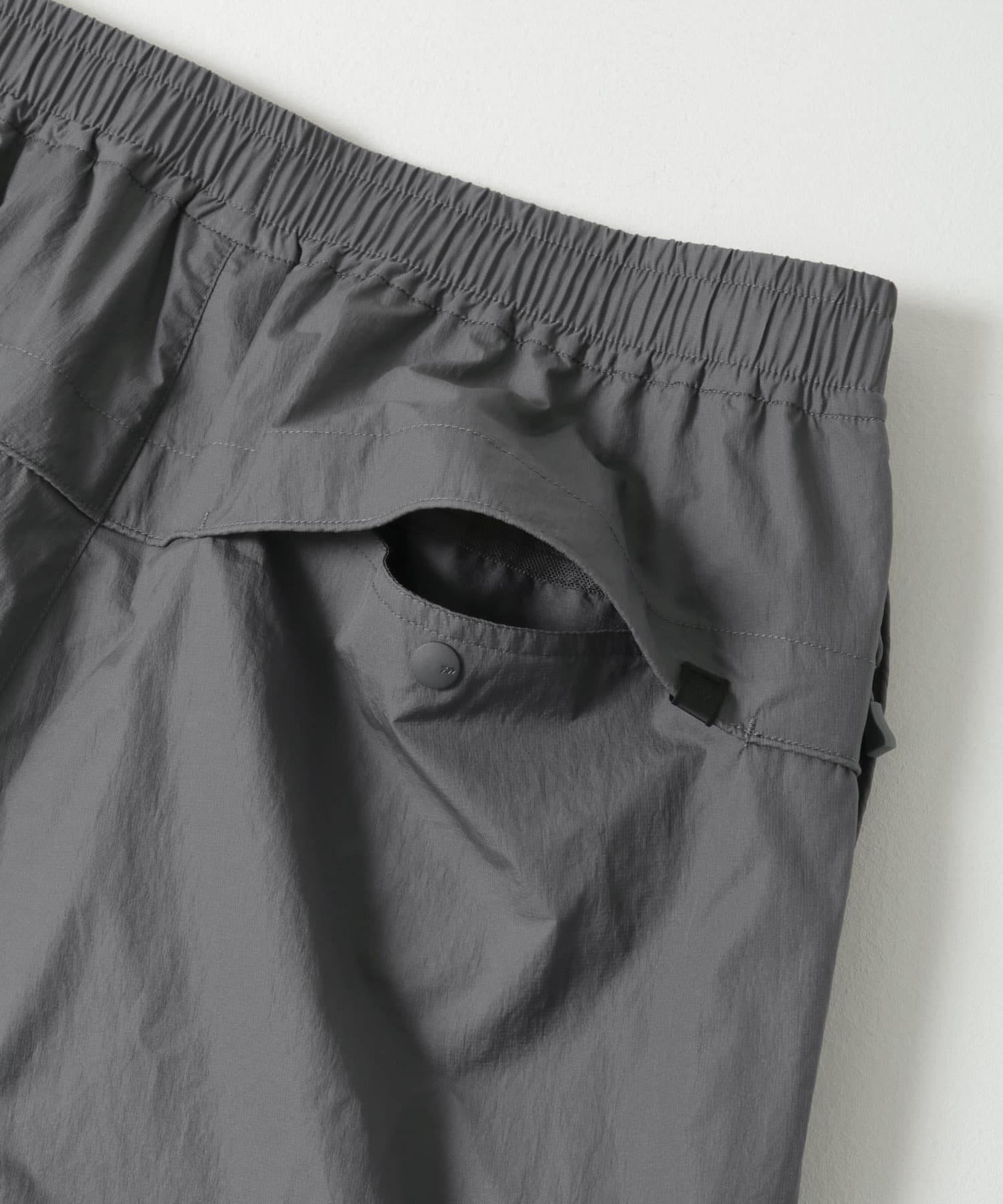 DAIWA PIER39　DECHATABLE WINDBREAKER PANTS CHARCOAL M