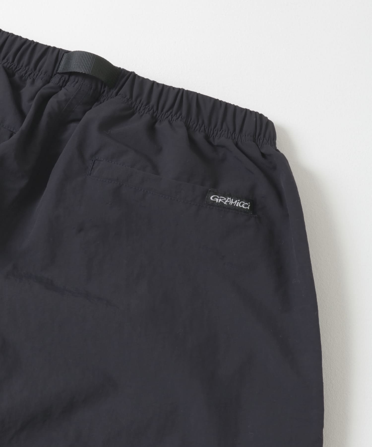 Gramicci / LOWERCASE　NYLON TRACK PANT D.NAVY S