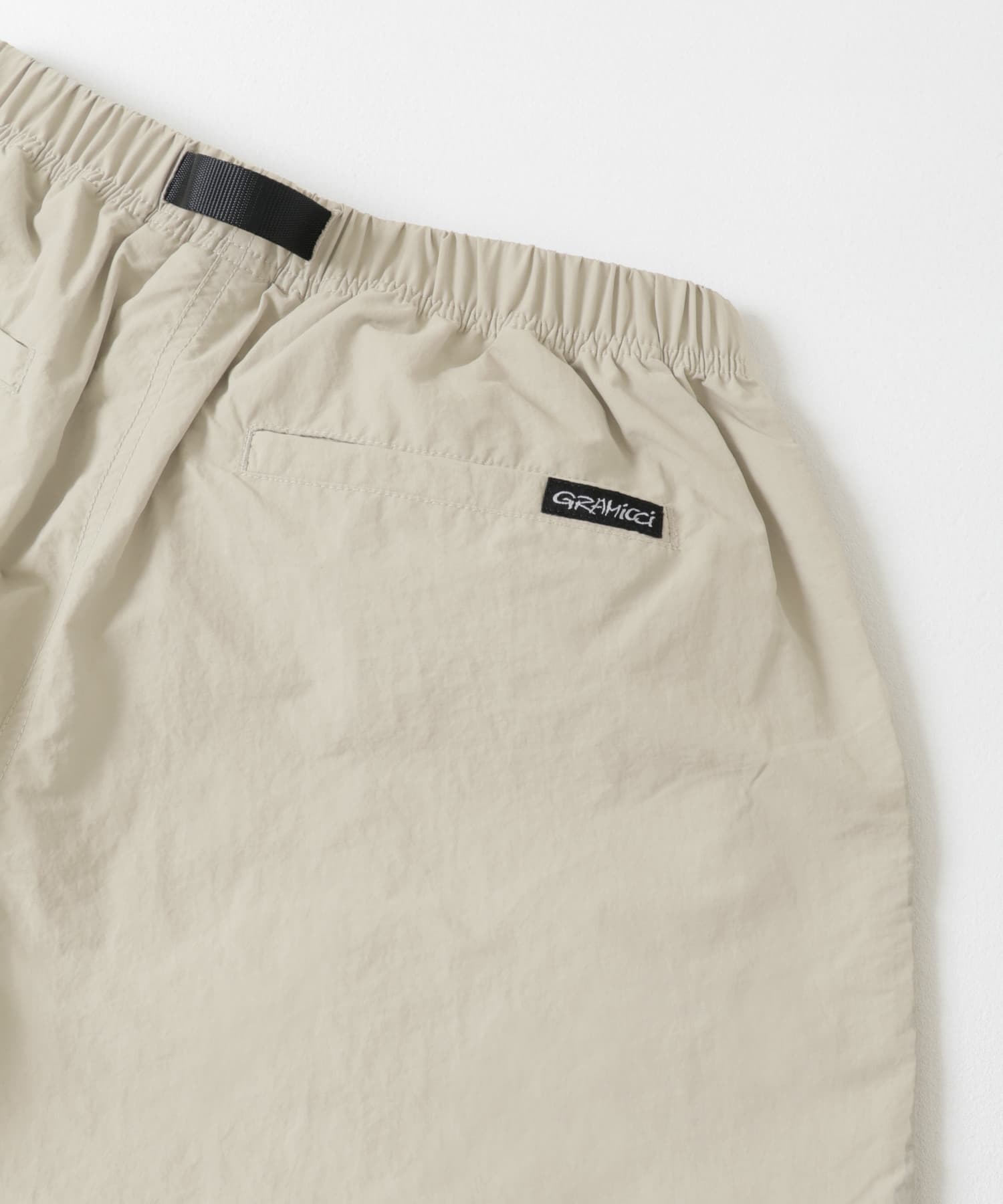 Gramicci / LOWERCASE　NYLON TRACK PANT DUNE S