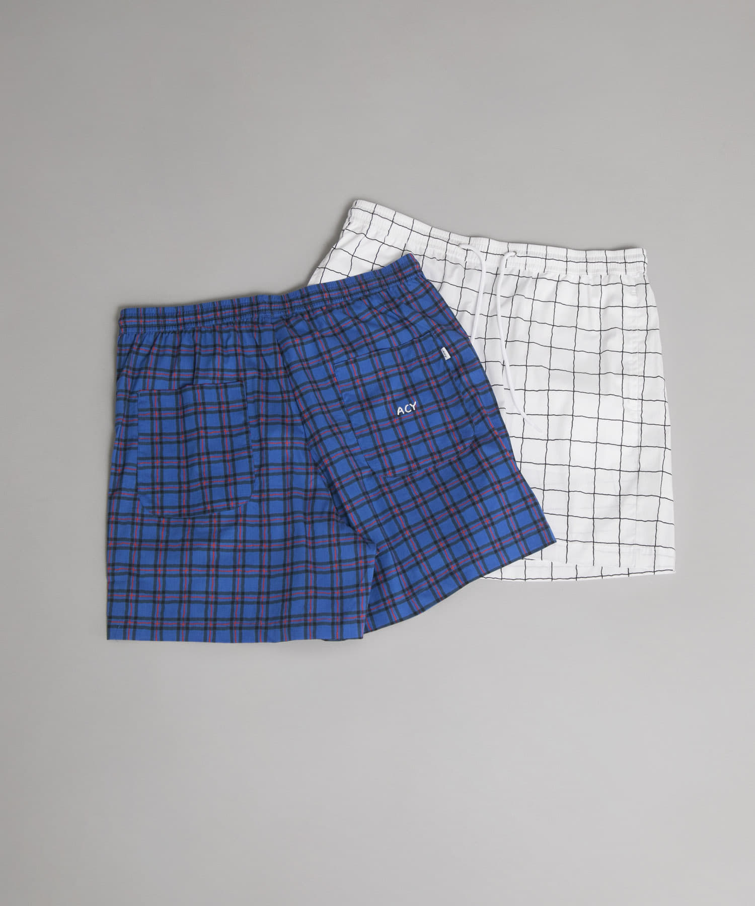 Acy　AK PATTERN SHORTS AK.CHECK 2