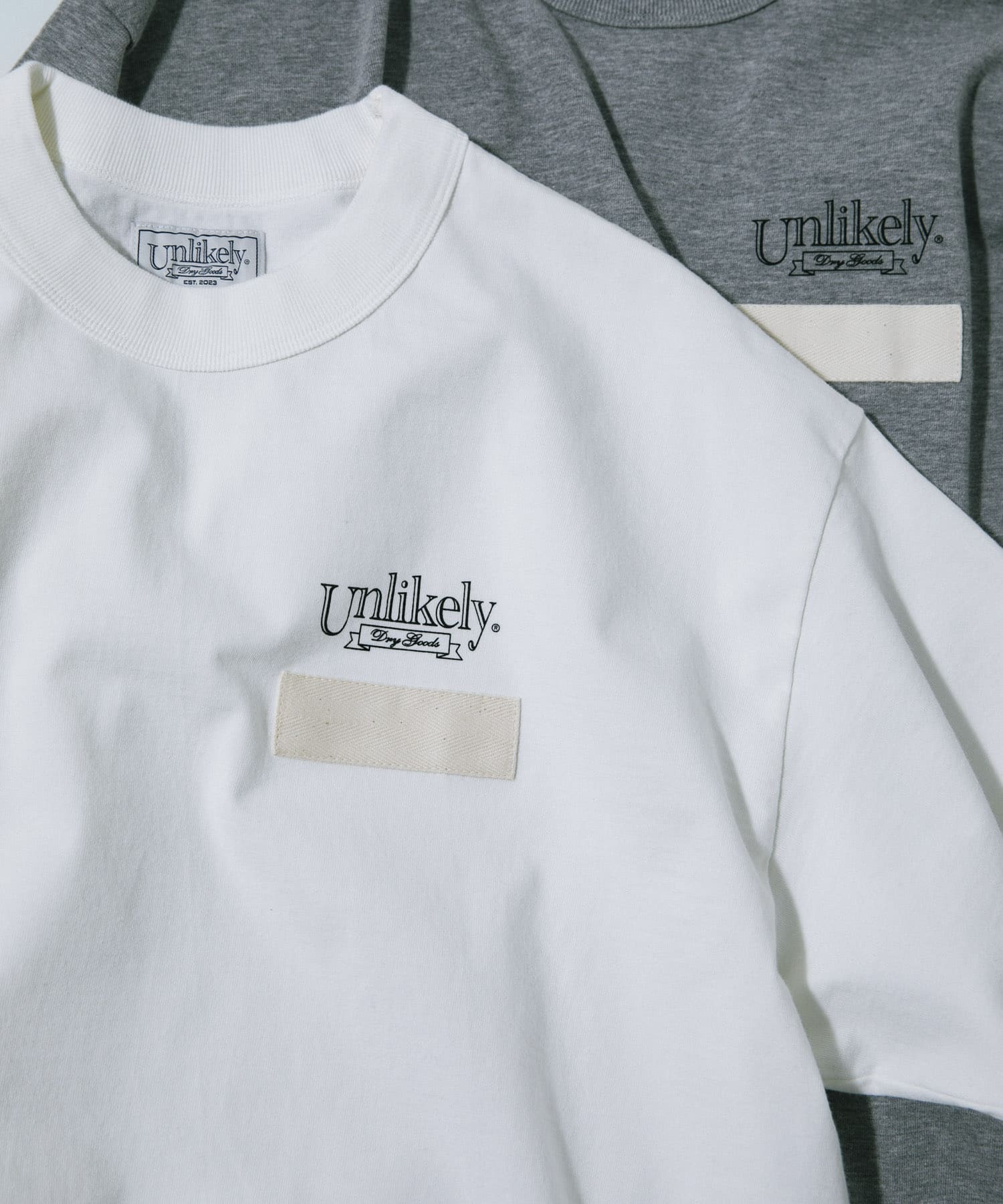 Unlikely　Unlikely Team Tee White M