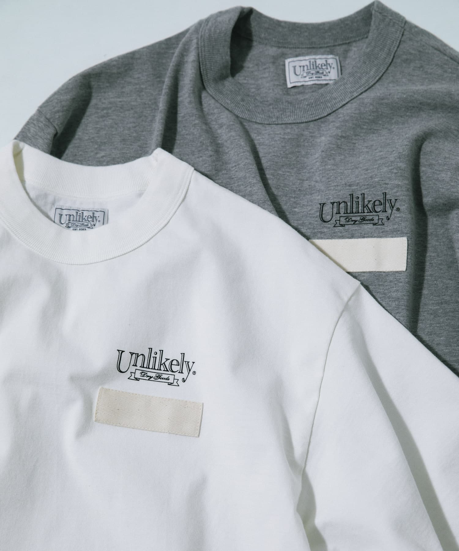 Unlikely　Unlikely Team Tee White M