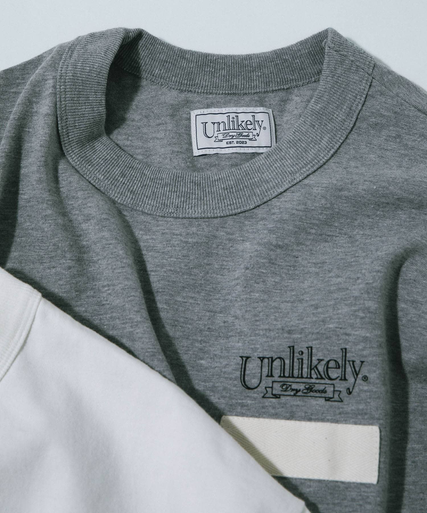 Unlikely　Unlikely Team Tee White M