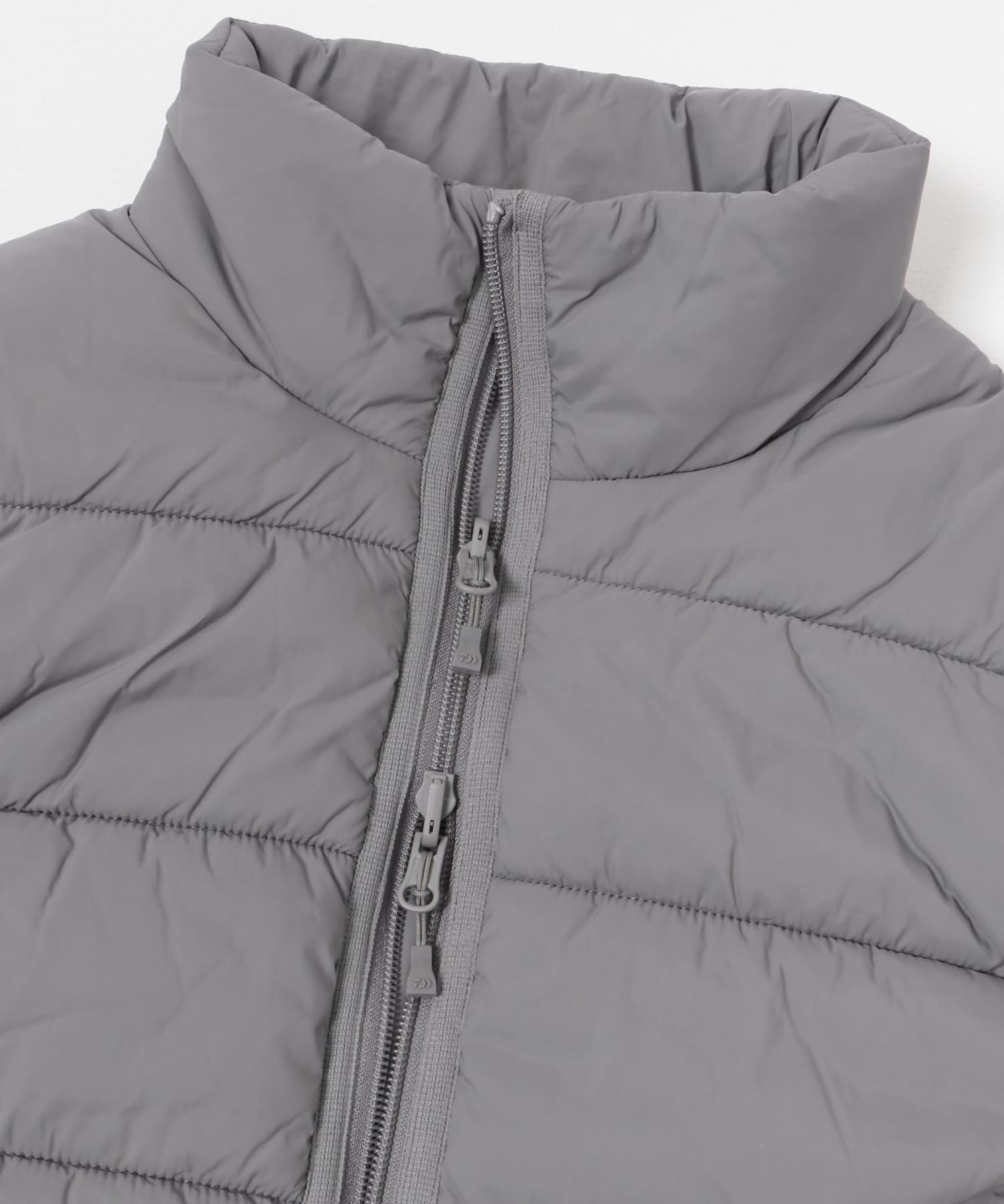 DAIWA PIER39　W's TECH REVERSIBLE CLIMBERS PUFFVEST LT.GRAY FREE