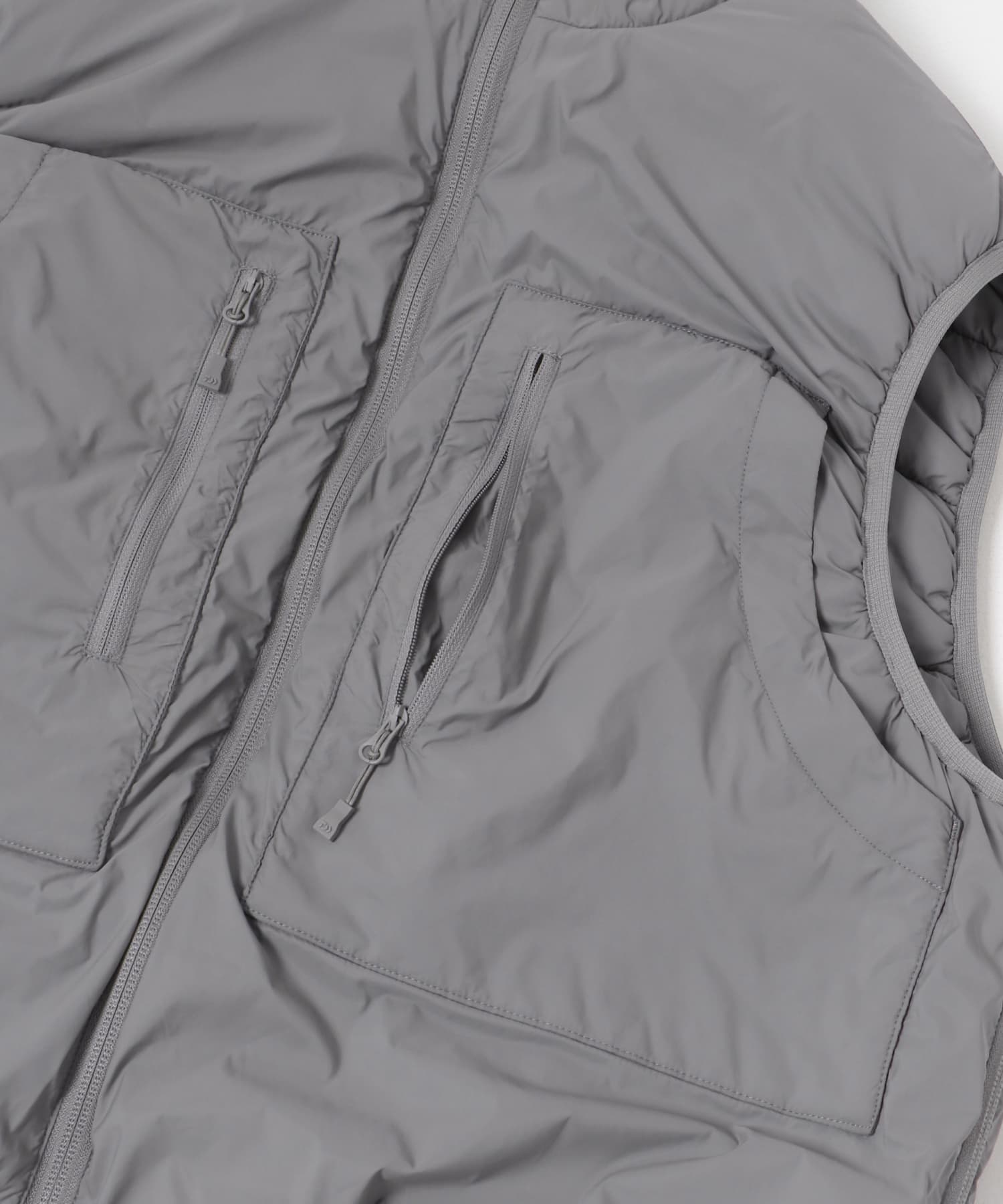 DAIWA PIER39　W's TECH REVERSIBLE CLIMBERS PUFFVEST LT.GRAY FREE