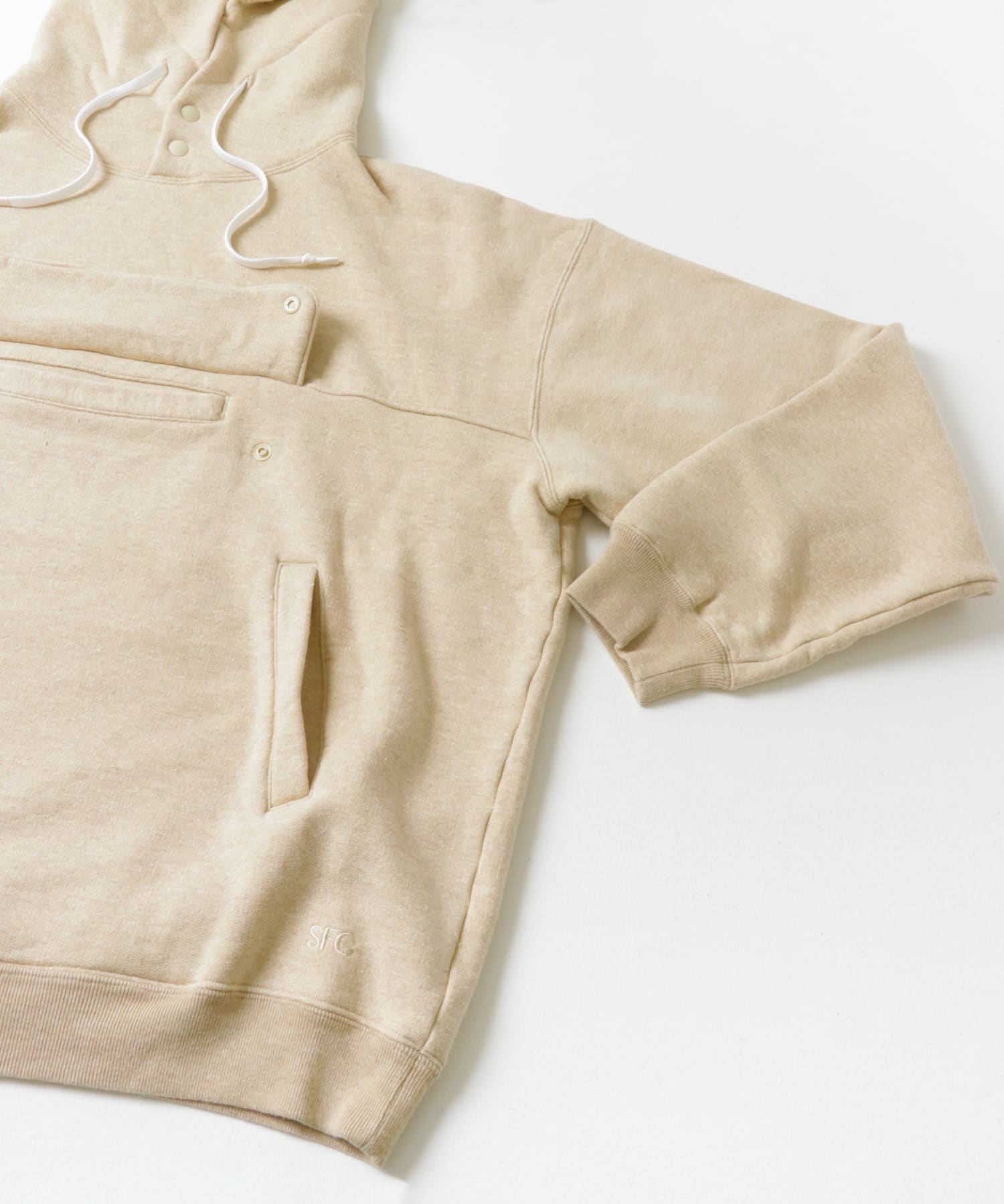 M Beige