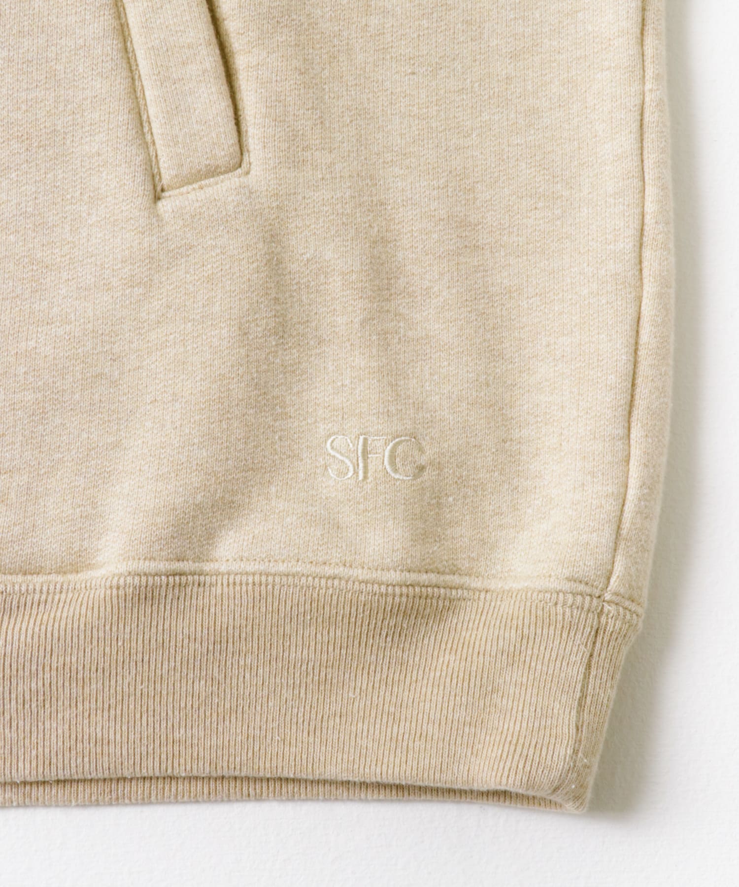 M Beige