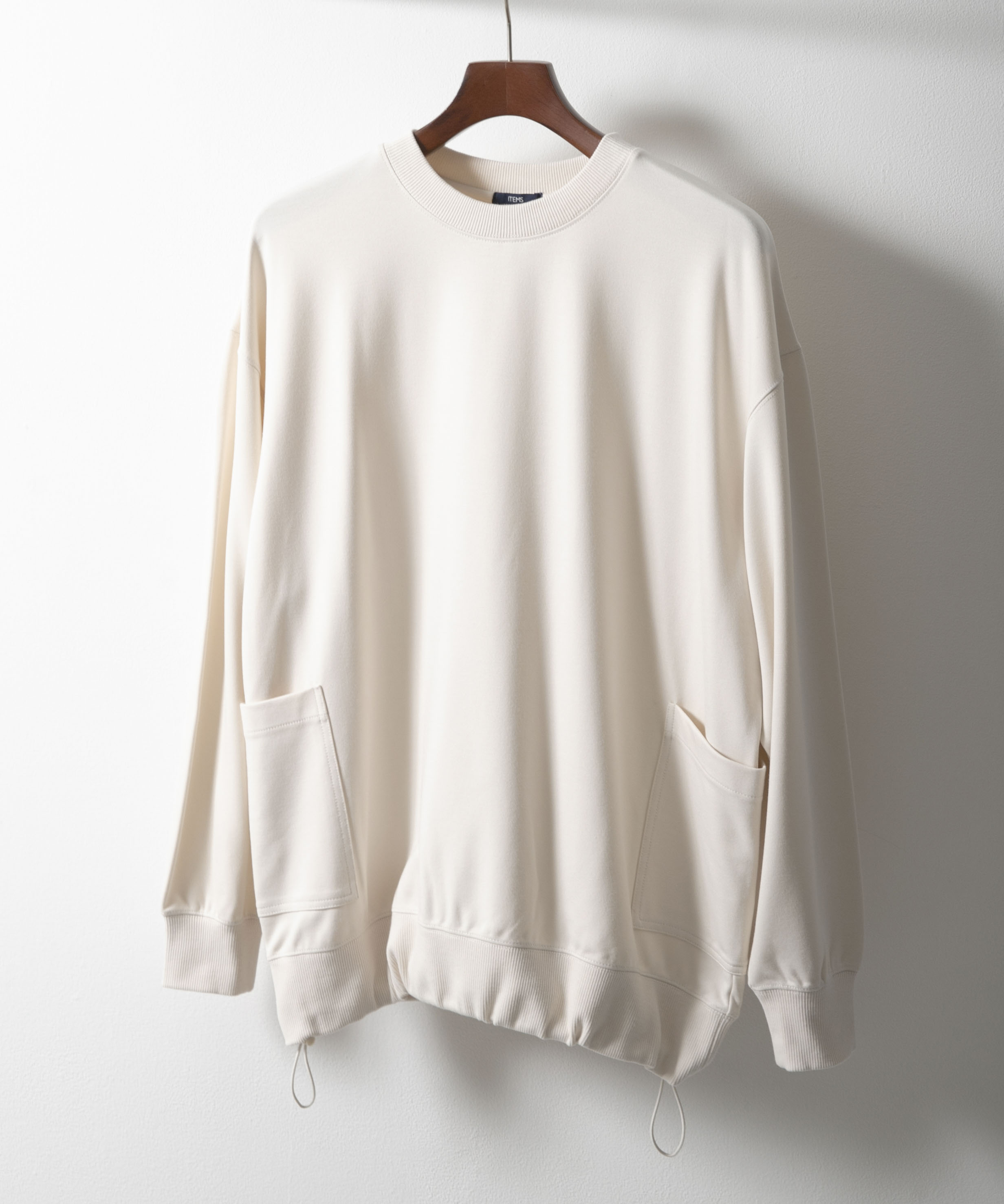 サイドストレージ長袖ポンチTops
