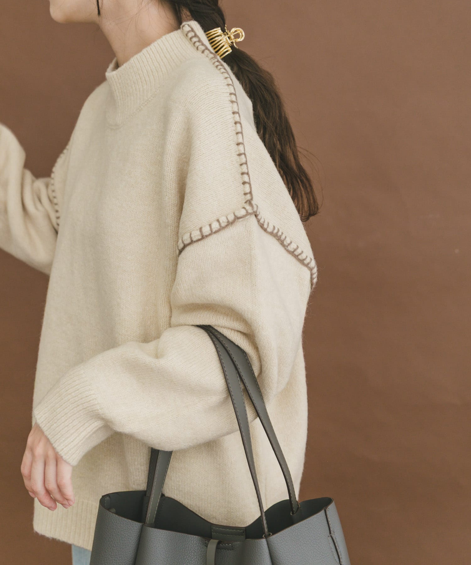 ハンドステッチハイネックニット