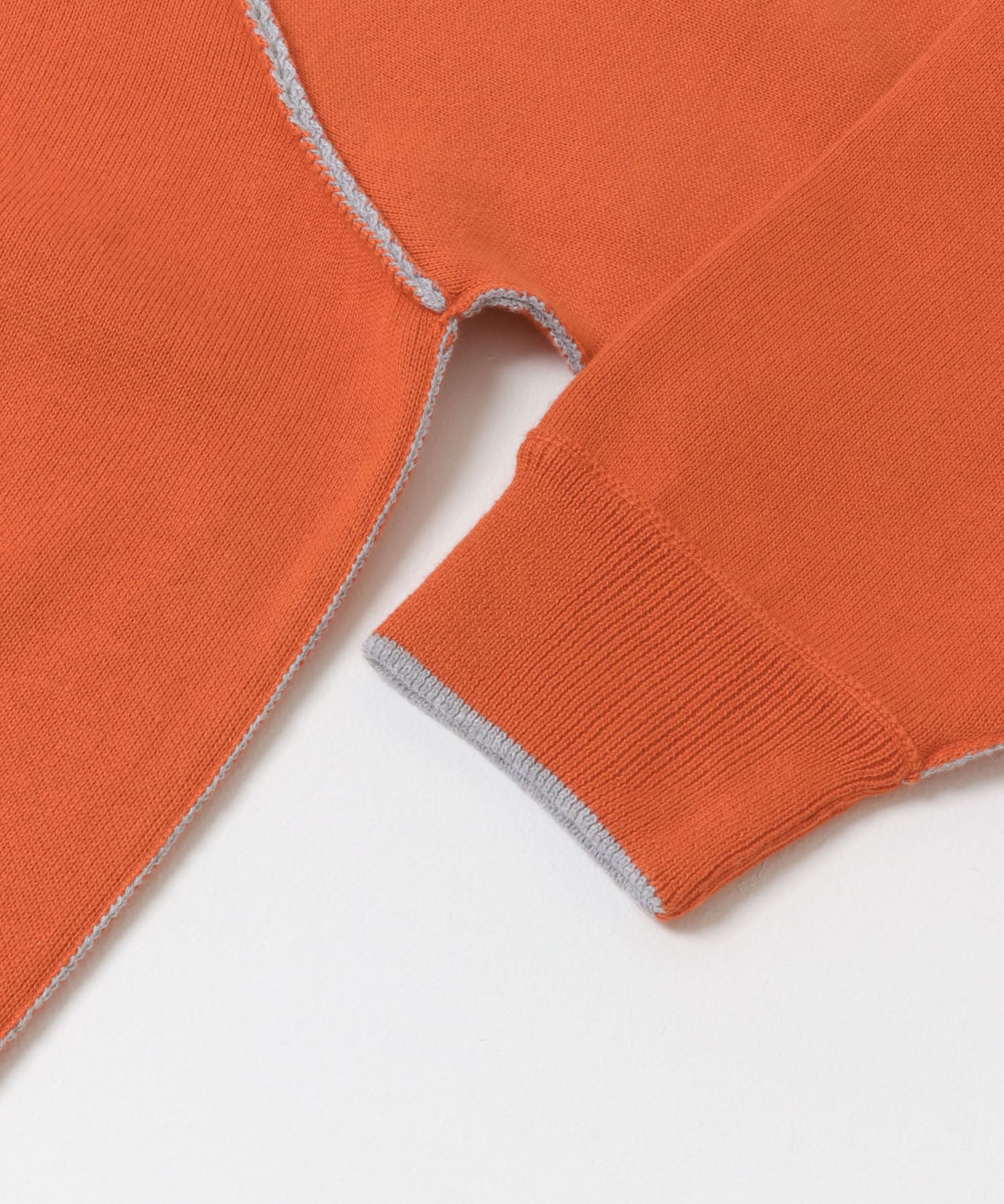 ラグランスリーブリバーシブルニット ORG×GRY Free