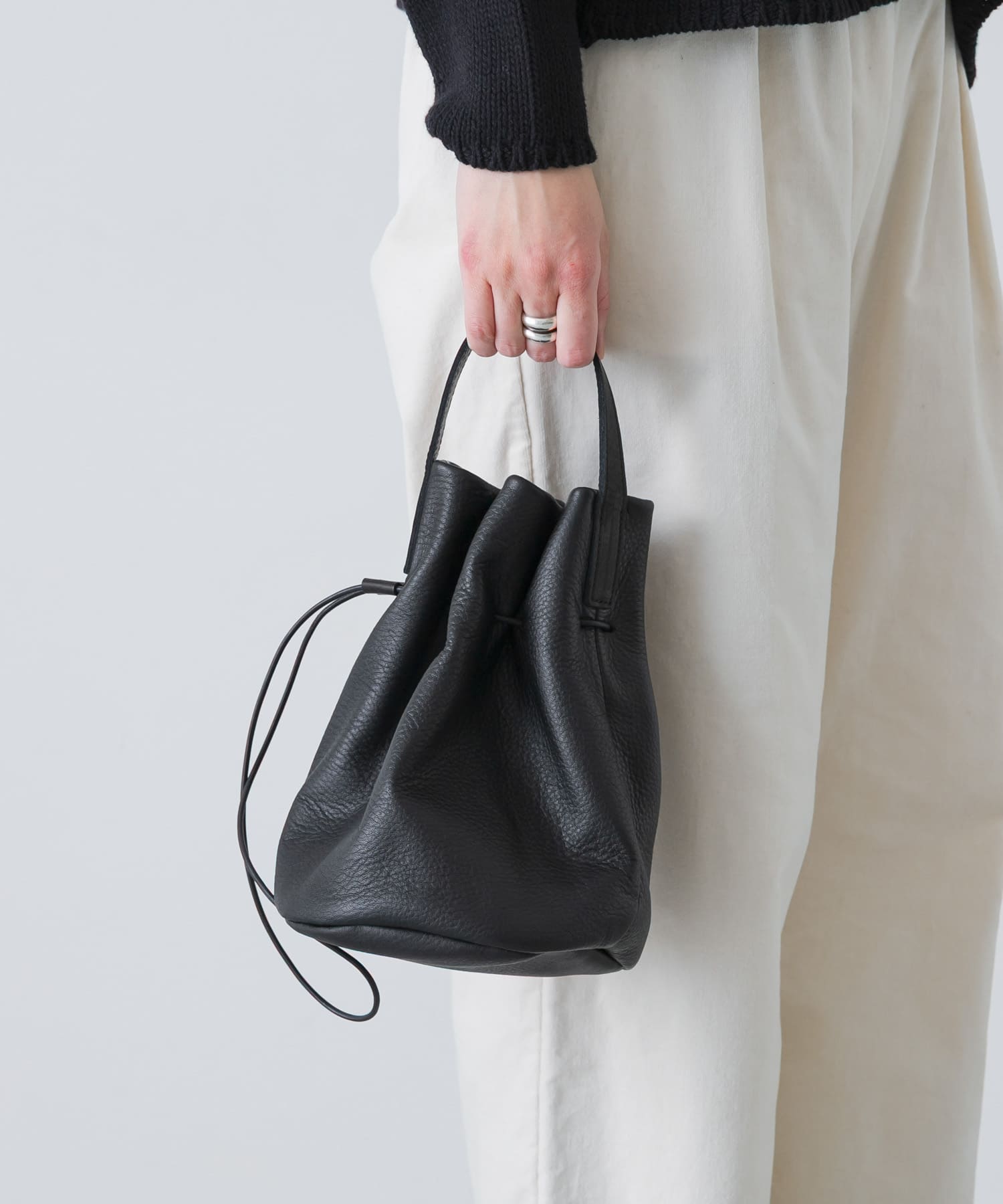 MORMYRUS　ワンハンドルドローストリングバッグ