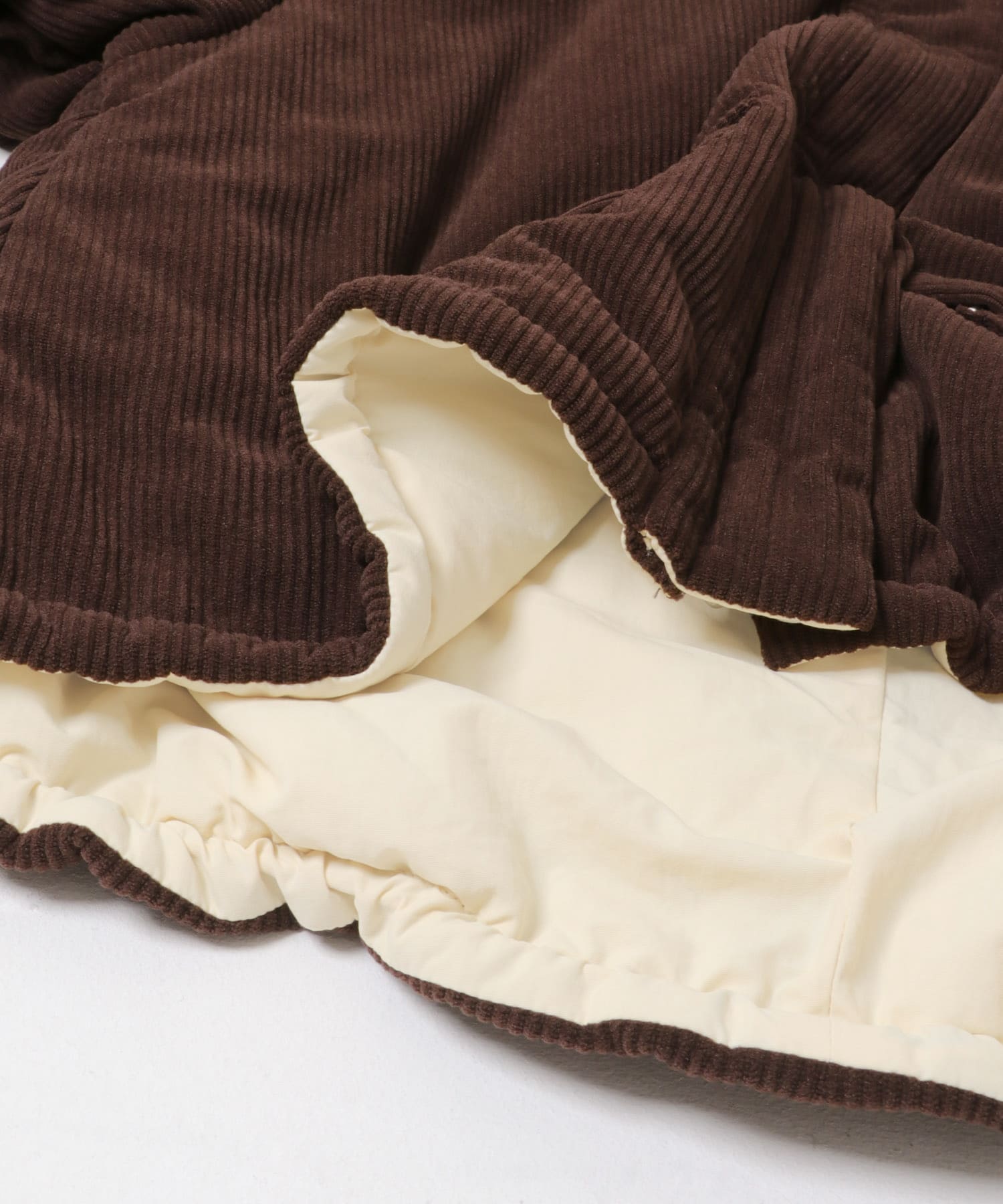 リバーシブルパデッドジャケット BRN×CREAM one