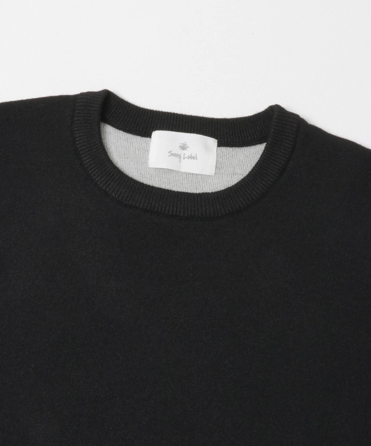抗ピルウォッシャブルクルーネックニット ブラック M