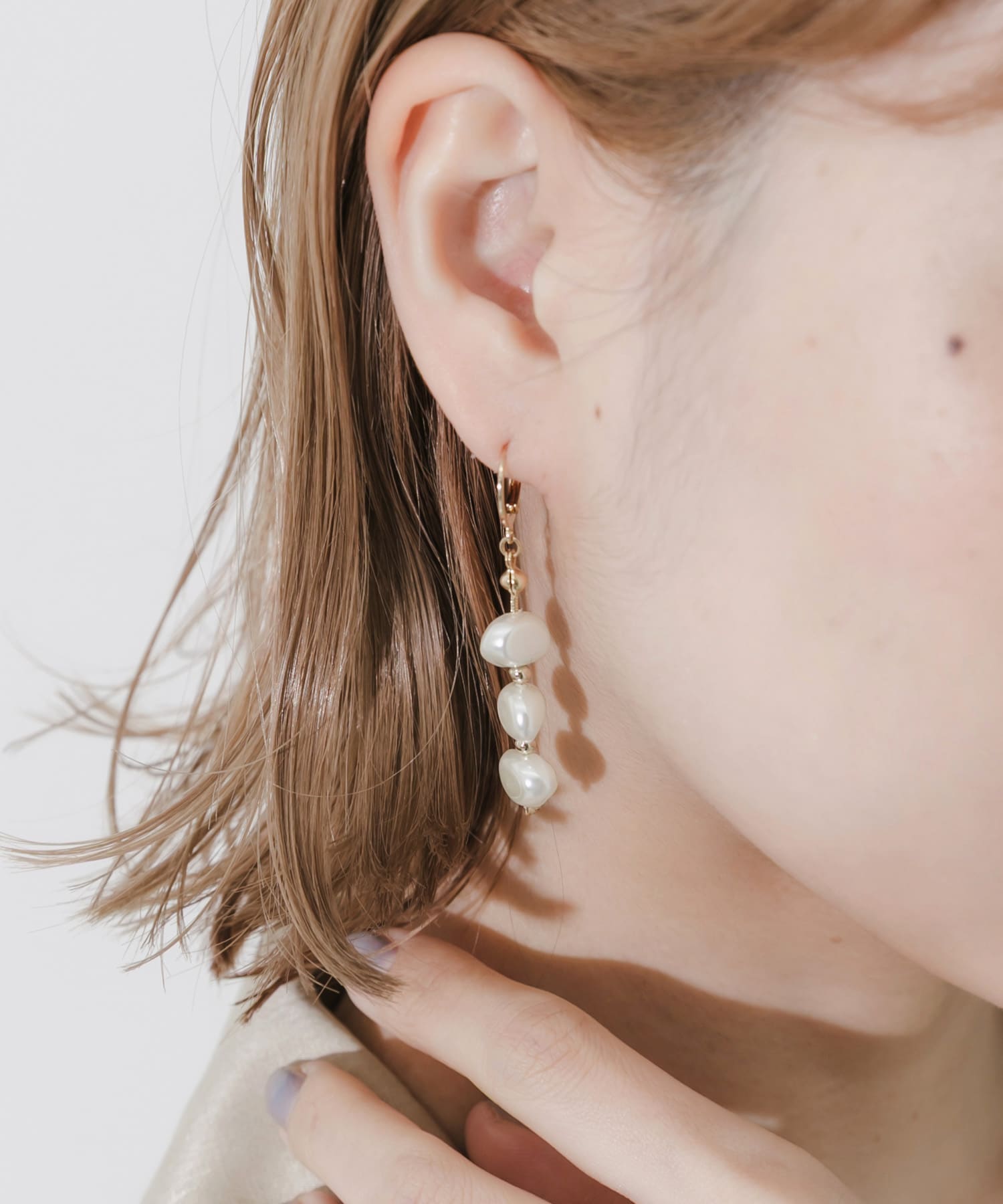 イビツパールスウィングフープピアス