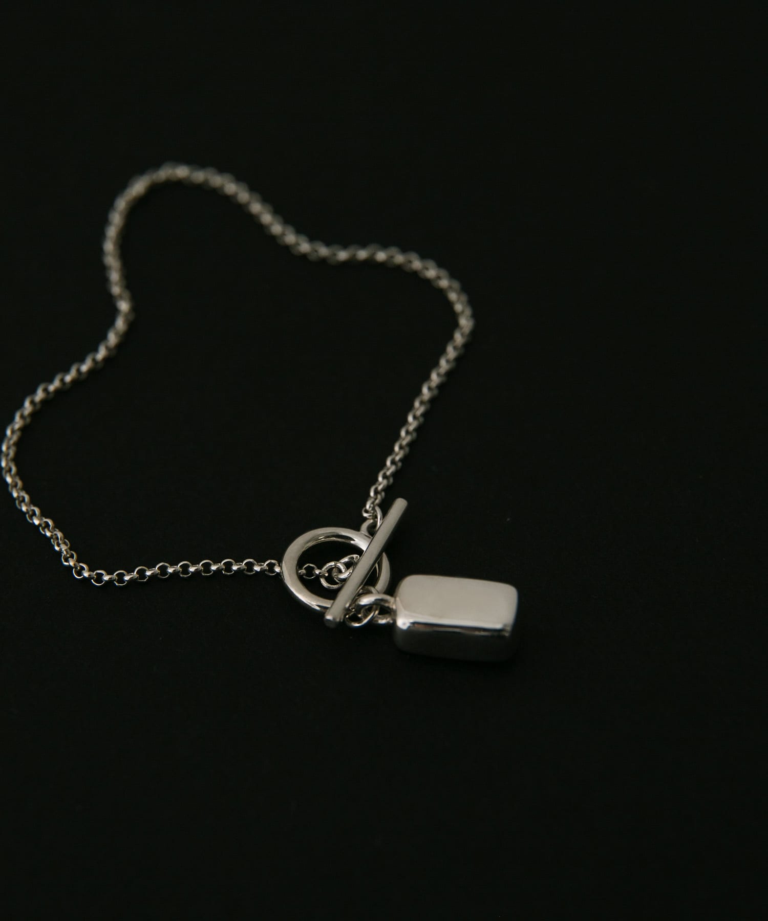 SMELLY so’　rectangle motif  bracelet SLV -