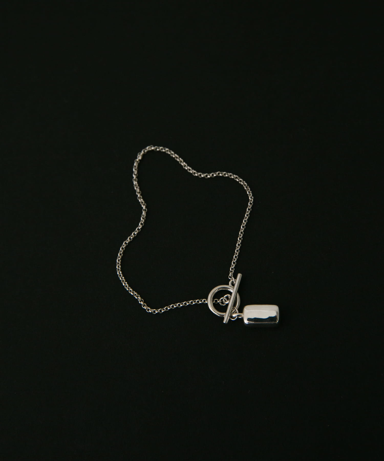 SMELLY so’　rectangle motif  bracelet SLV -