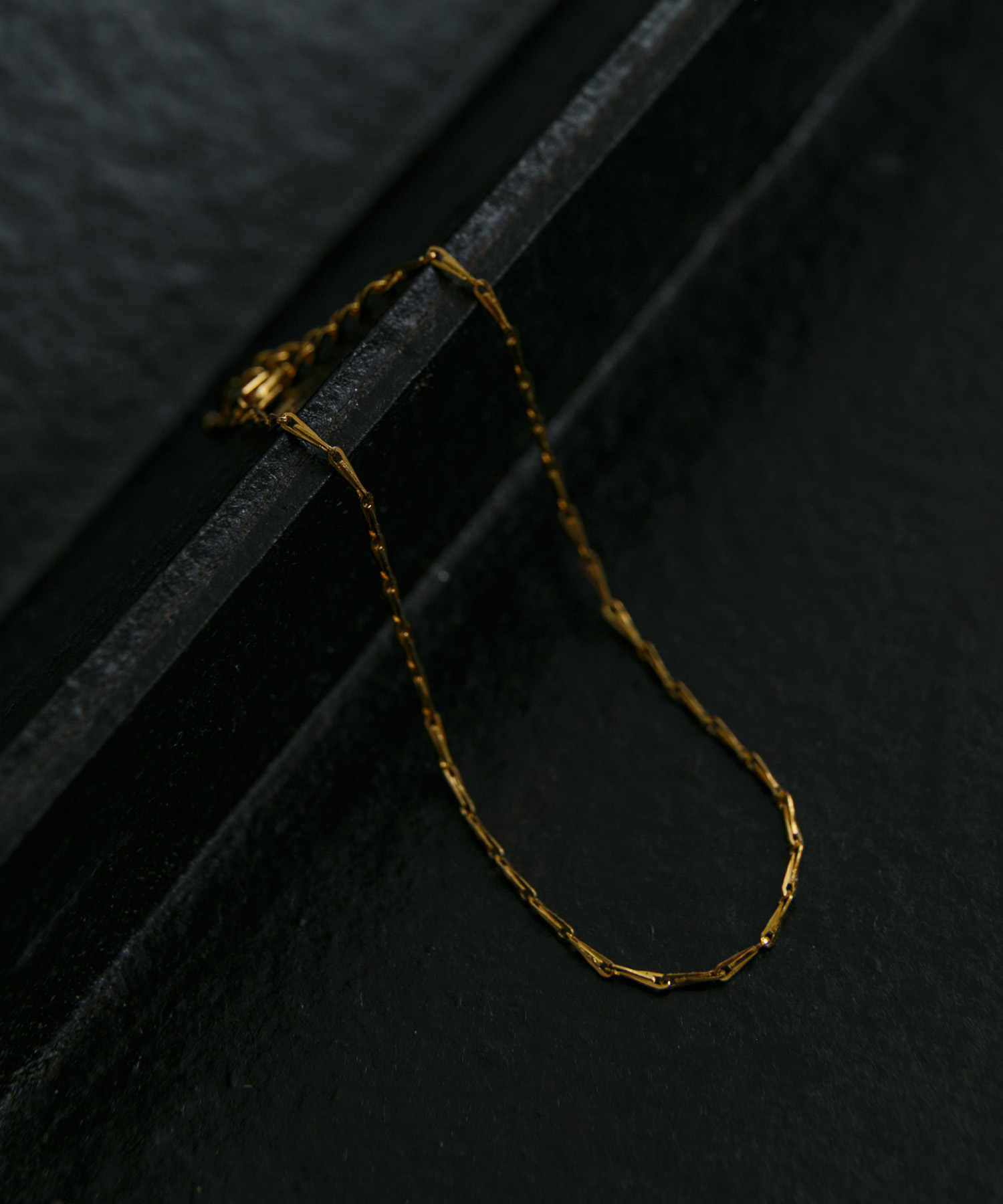 SMELLY so’　slim chain brecelet