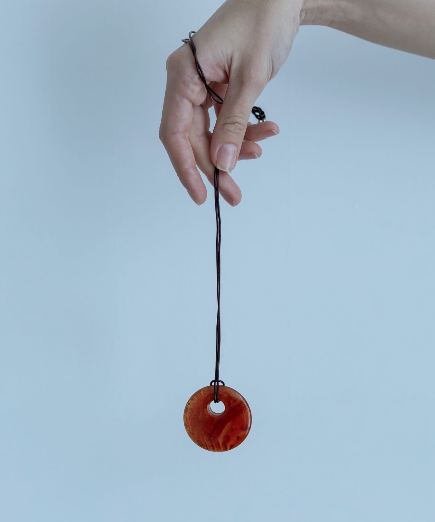 SMELLY so’　carnelian cord necklace