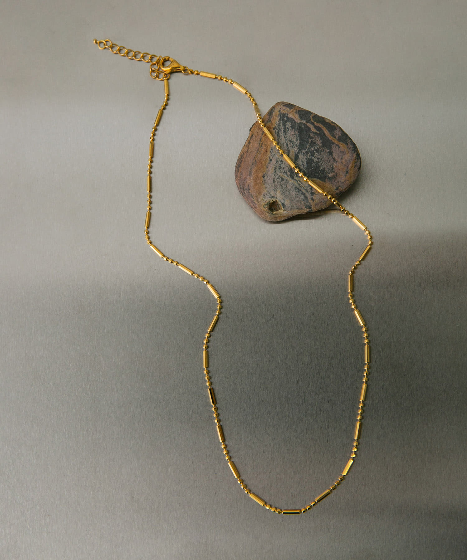 SMELLY so’　uneven chain necklace