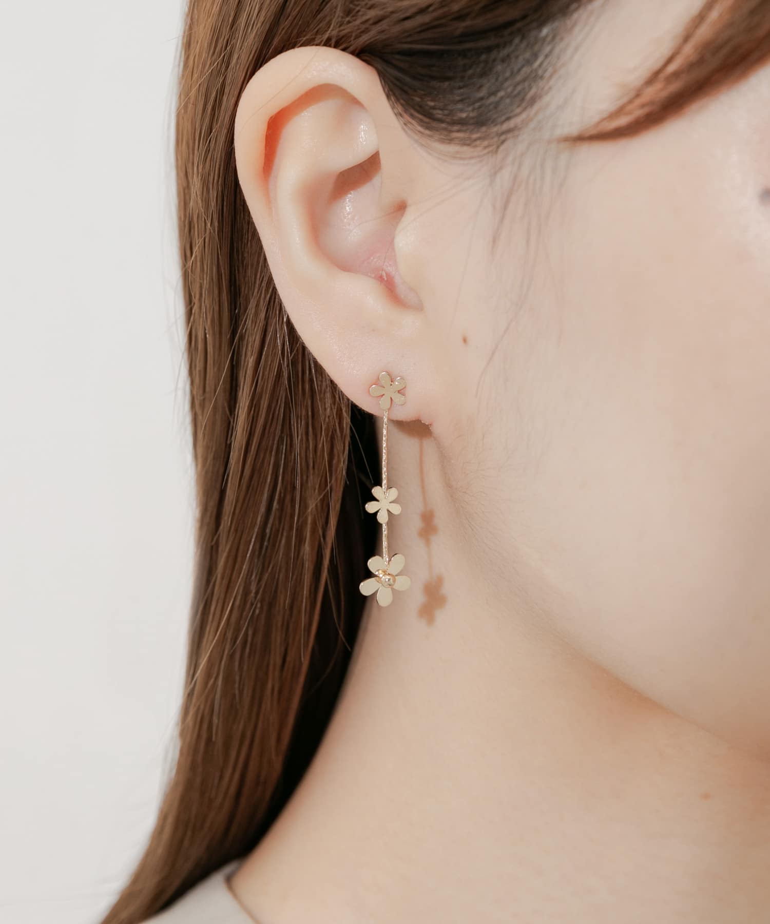 ミニフラワースウィングピアス GLD -