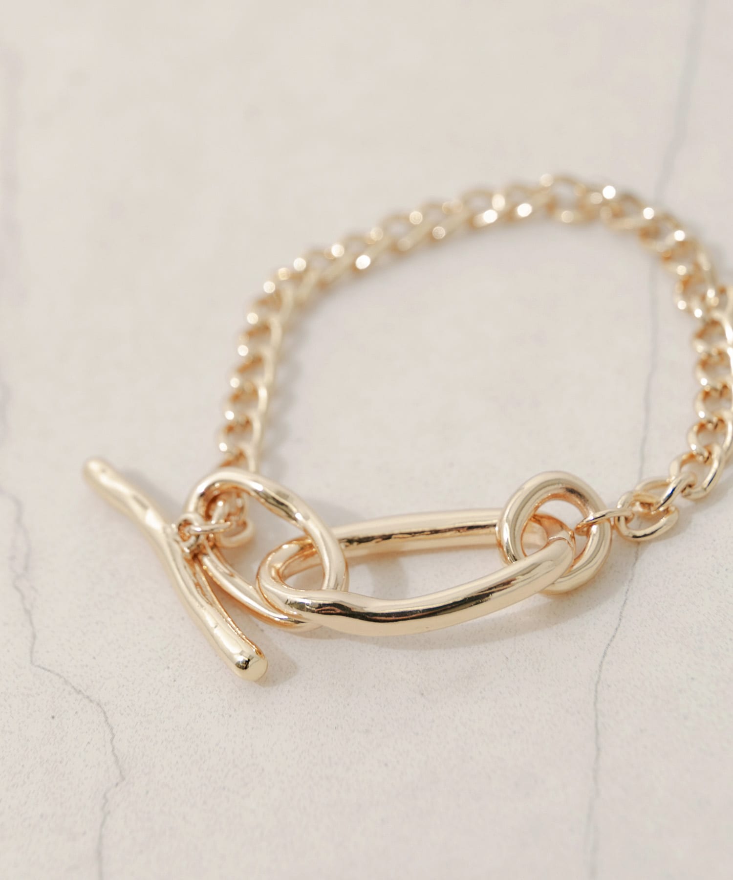 ニュアンスオーバルチェーンマンテルブレスレット GLD -