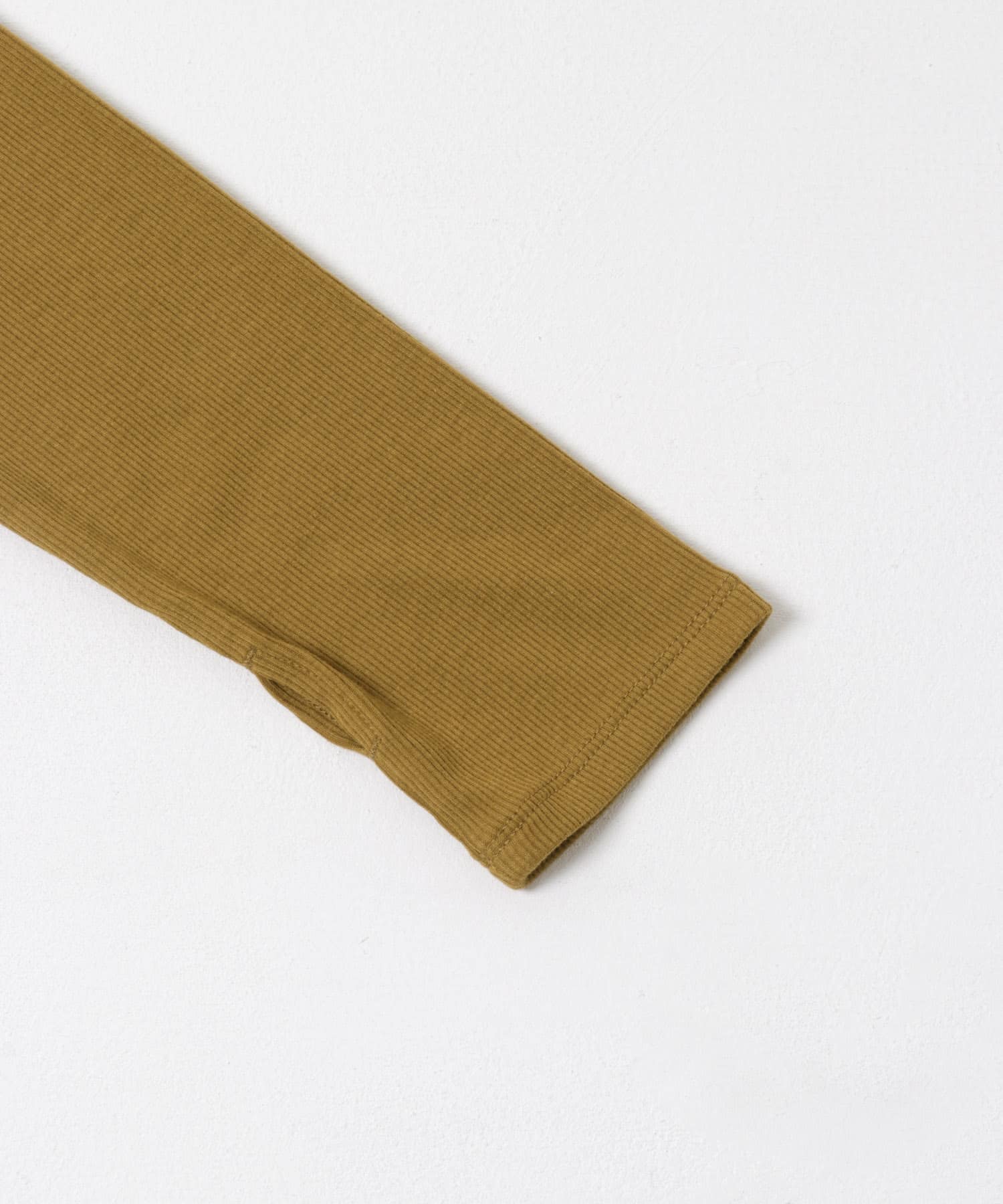 アシンメトリーリブコンパクトトップ CAMEL one