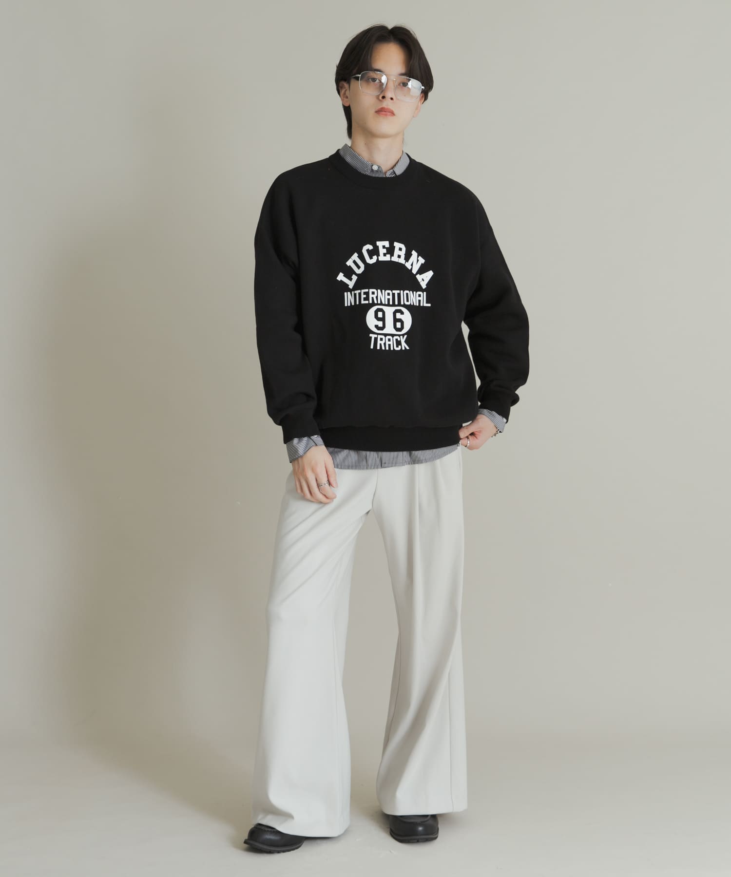 スウェットライクカレッジロゴニット BLACK M