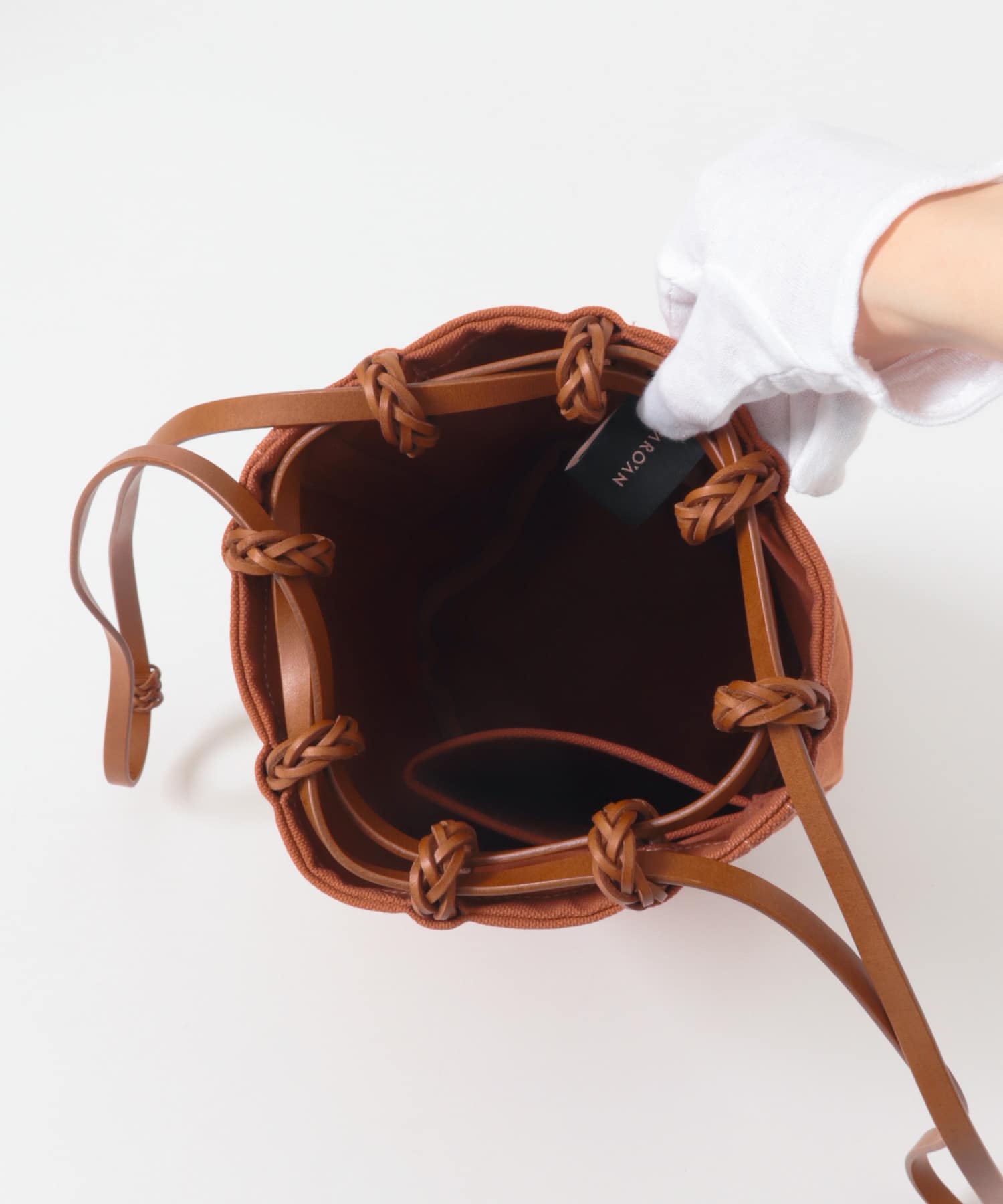 KAMARO’AN　Woven Drawstring BucketBag Ochre-Red one