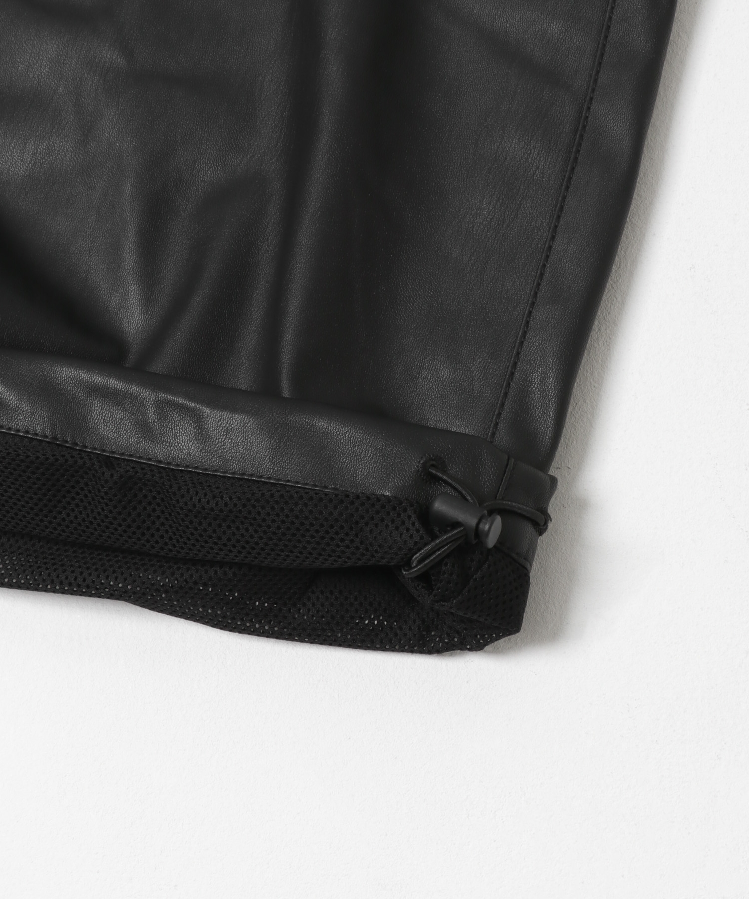 DAIWA PIER39　TECH SYNTHETIC SKIN WINDBREAKER PANTS BLACK M