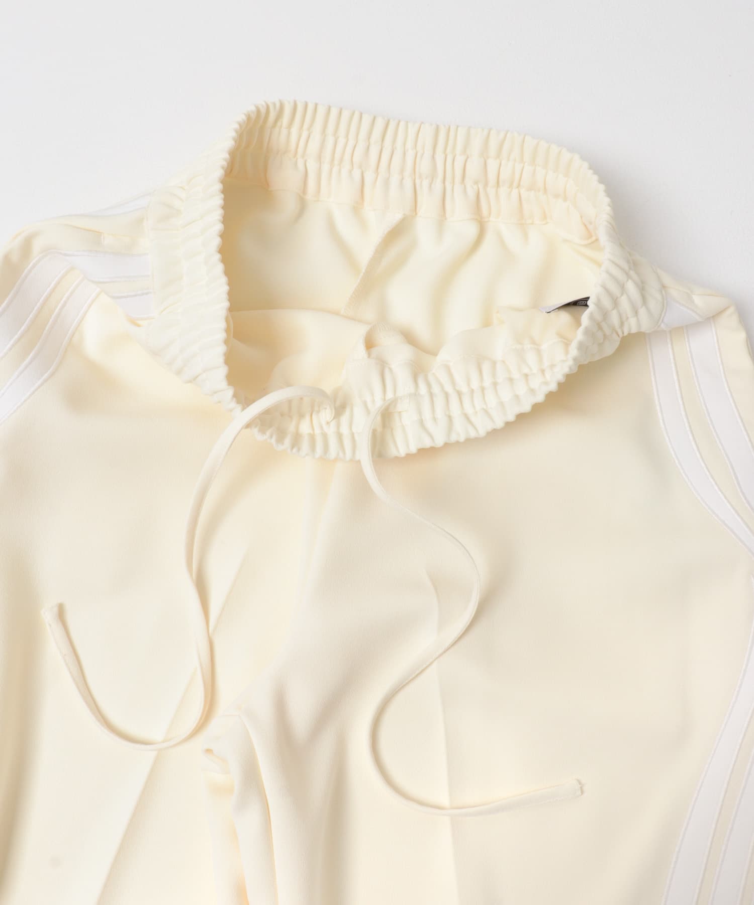 LAYAS　JOURSEY TRACK PANTS WHITE One